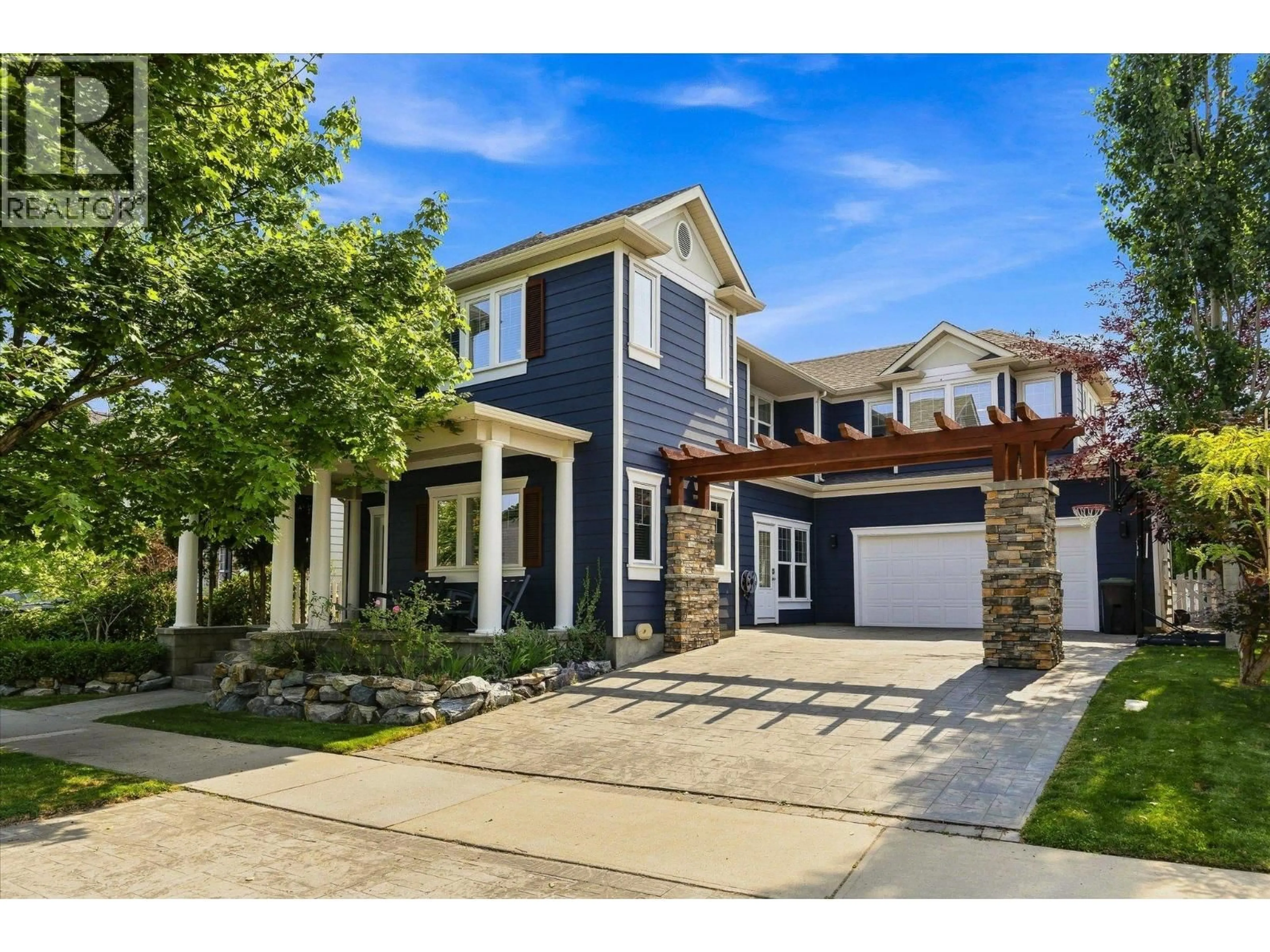 Home with brick exterior material, street for 361 QUILCHENA DRIVE, Kelowna British Columbia V1W4W4