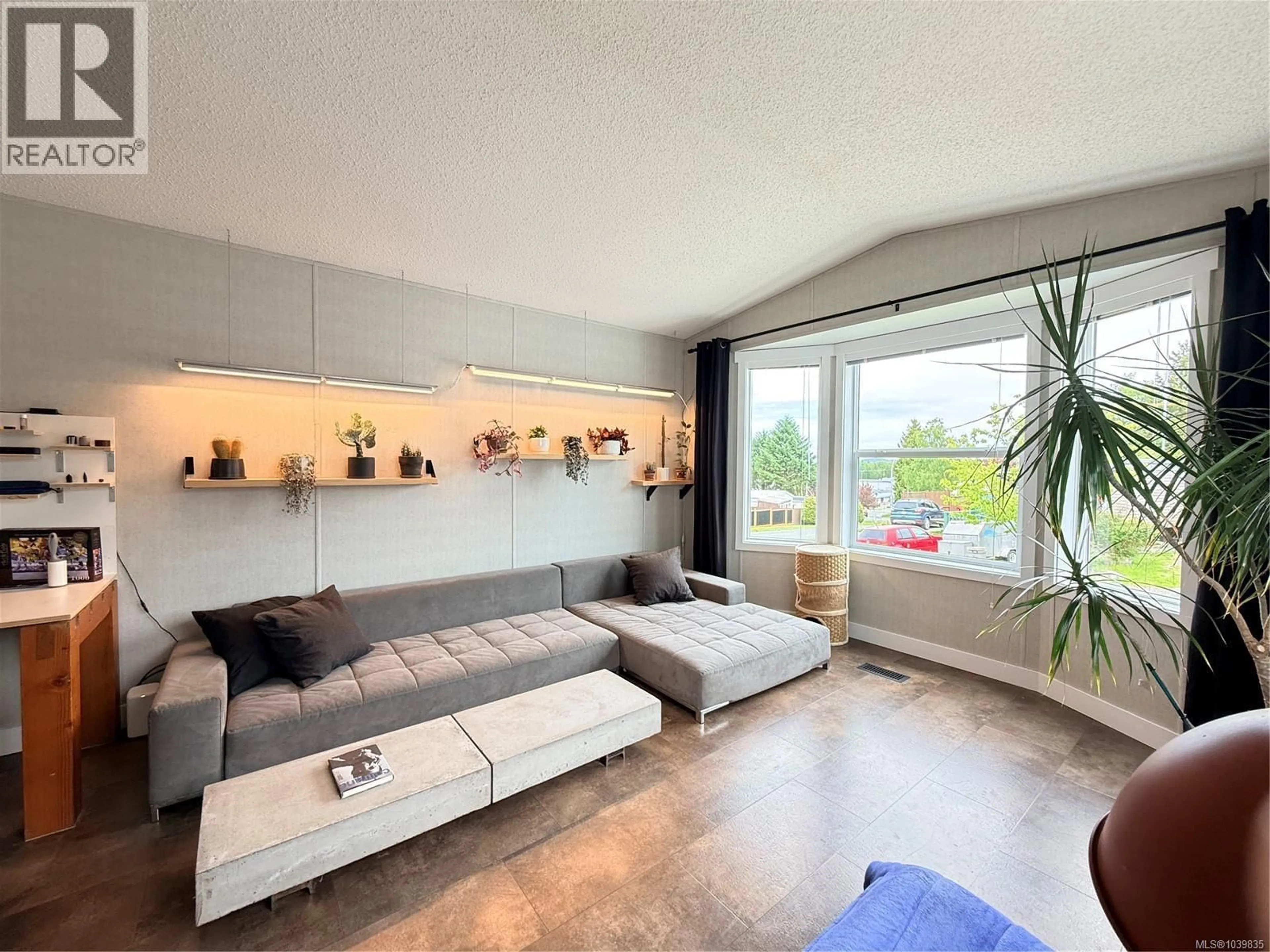 Living room with furniture, unknown for 7312 KLAKISH PLACE, Port Hardy British Columbia V0N2P0