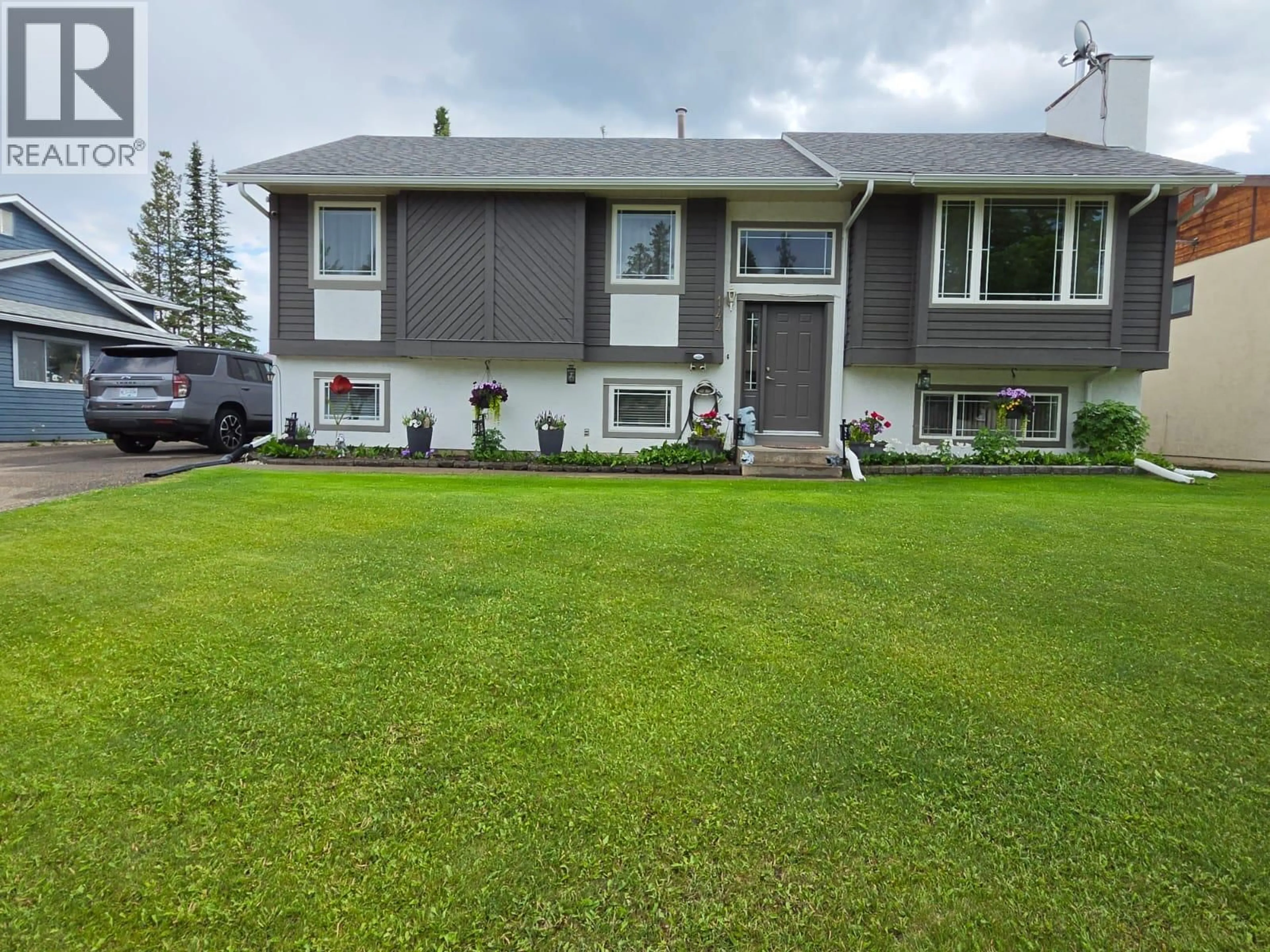 A pic from outside/outdoor area/front of a property/back of a property/a pic from drone, street for 144 CHAMBERLAIN CRESCENT, Tumbler Ridge British Columbia V0C2W0