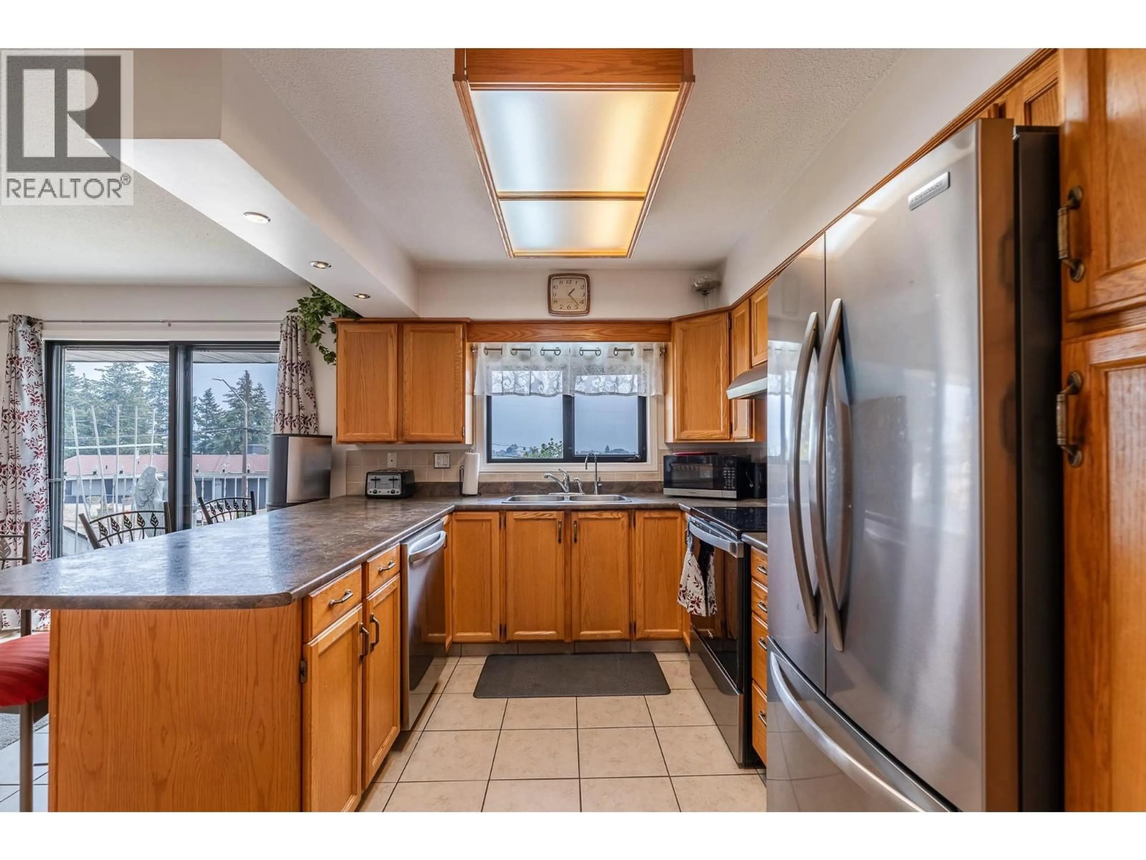 Standard kitchen, ceramic/tile floor for 8 - 8704 PURVES ROAD, Summerland British Columbia V0H1Z5