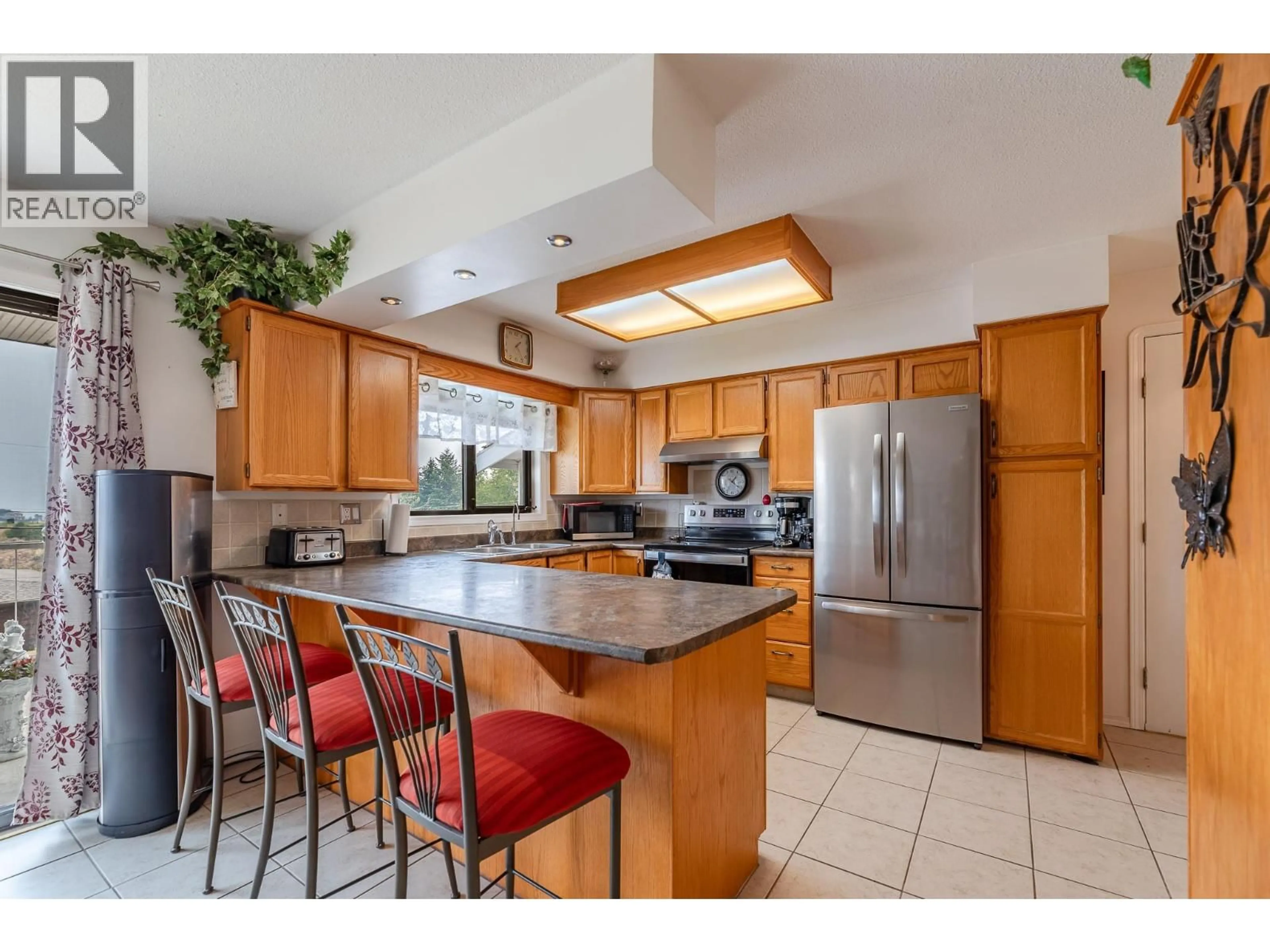 Open concept kitchen, ceramic/tile floor for 8 - 8704 PURVES ROAD, Summerland British Columbia V0H1Z5