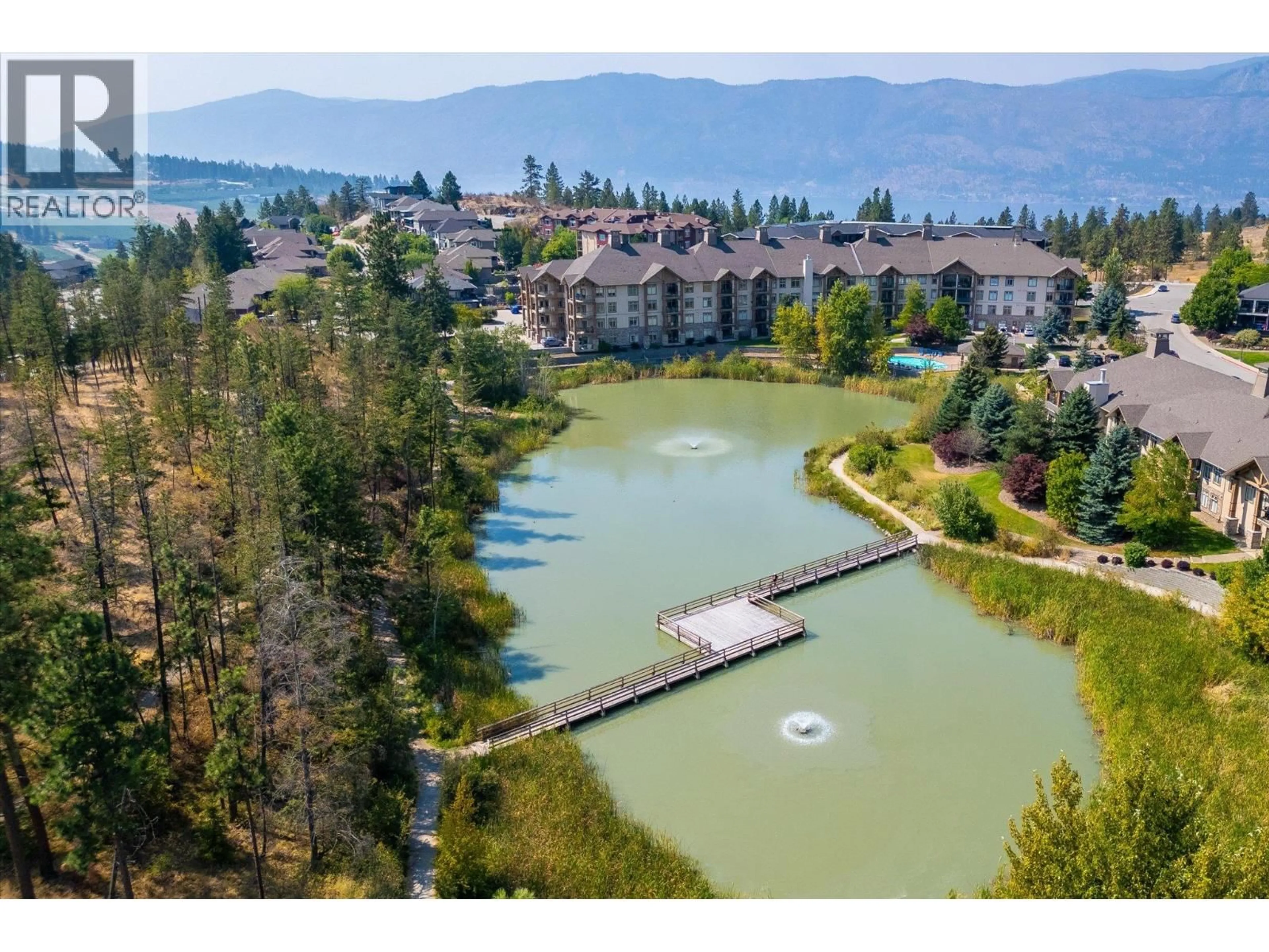 A pic from outside/outdoor area/front of a property/back of a property/a pic from drone, water/lake/river/ocean view for 318 - 2551 SHORELINE DRIVE, Lake Country British Columbia V4V2P2