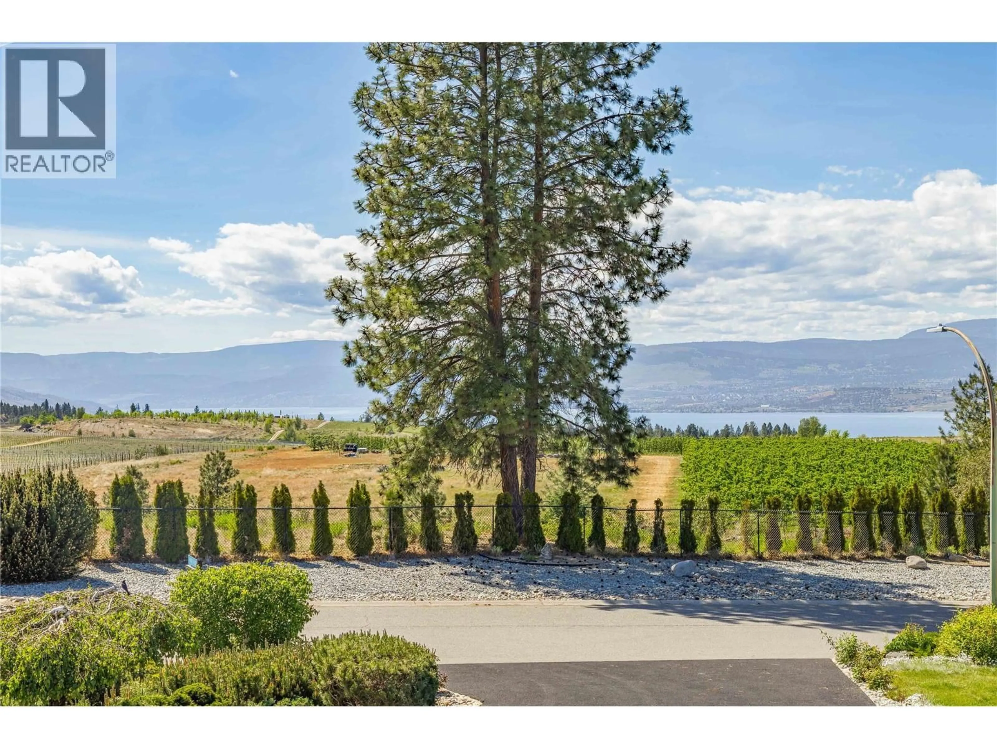 A pic from outside/outdoor area/front of a property/back of a property/a pic from drone, water/lake/river/ocean view for 4325 TAKLA ROAD, Kelowna British Columbia V1W3C4