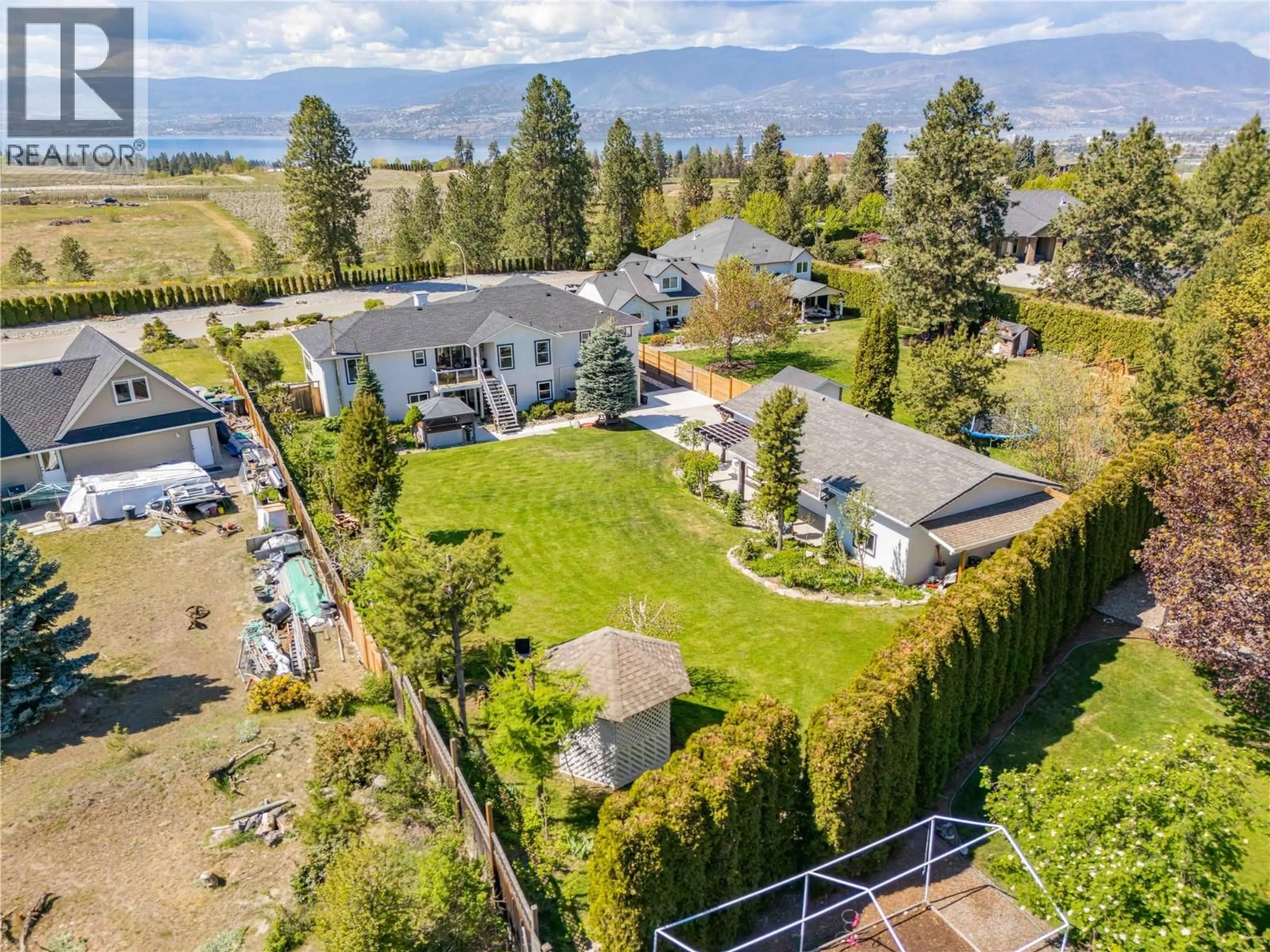 A pic from outside/outdoor area/front of a property/back of a property/a pic from drone, mountain view for 4325 TAKLA ROAD, Kelowna British Columbia V1W3C4
