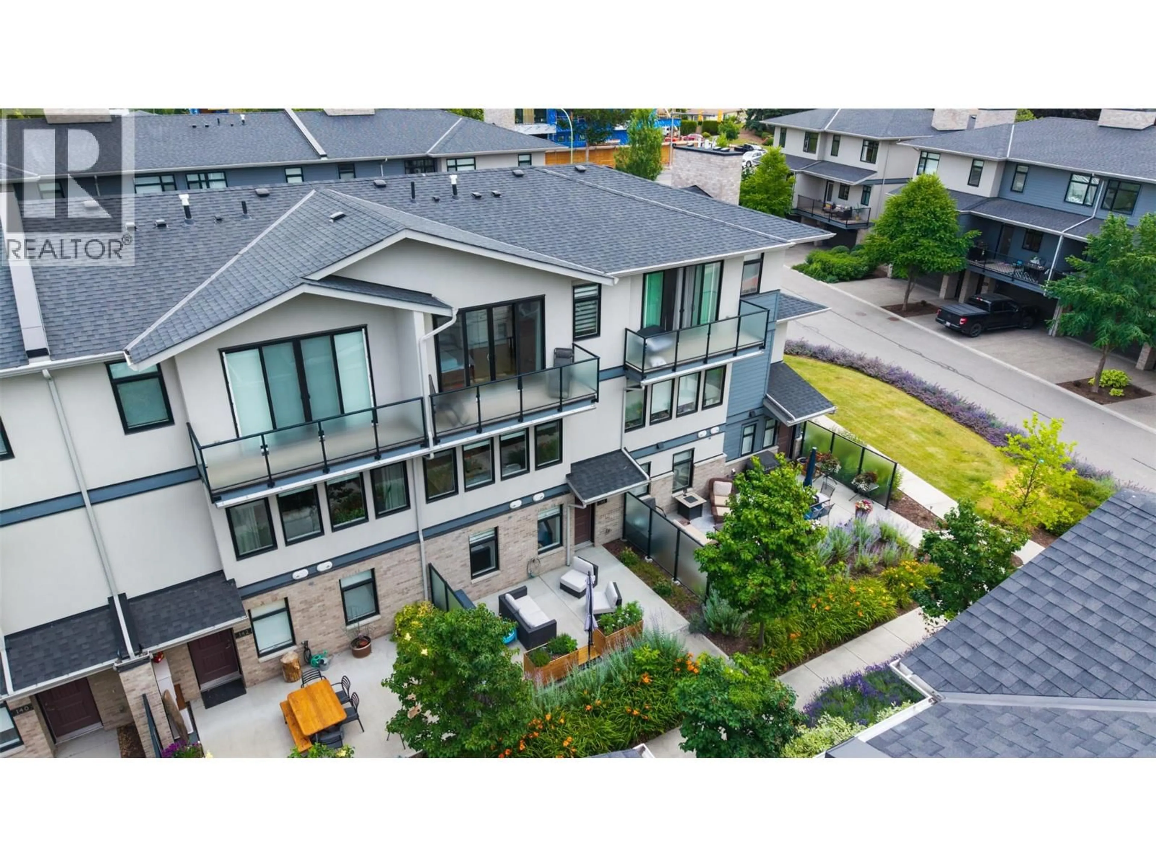 A pic from outside/outdoor area/front of a property/back of a property/a pic from drone, street for 144 - 1102 CAMERON AVENUE, Kelowna British Columbia V1Y0B2