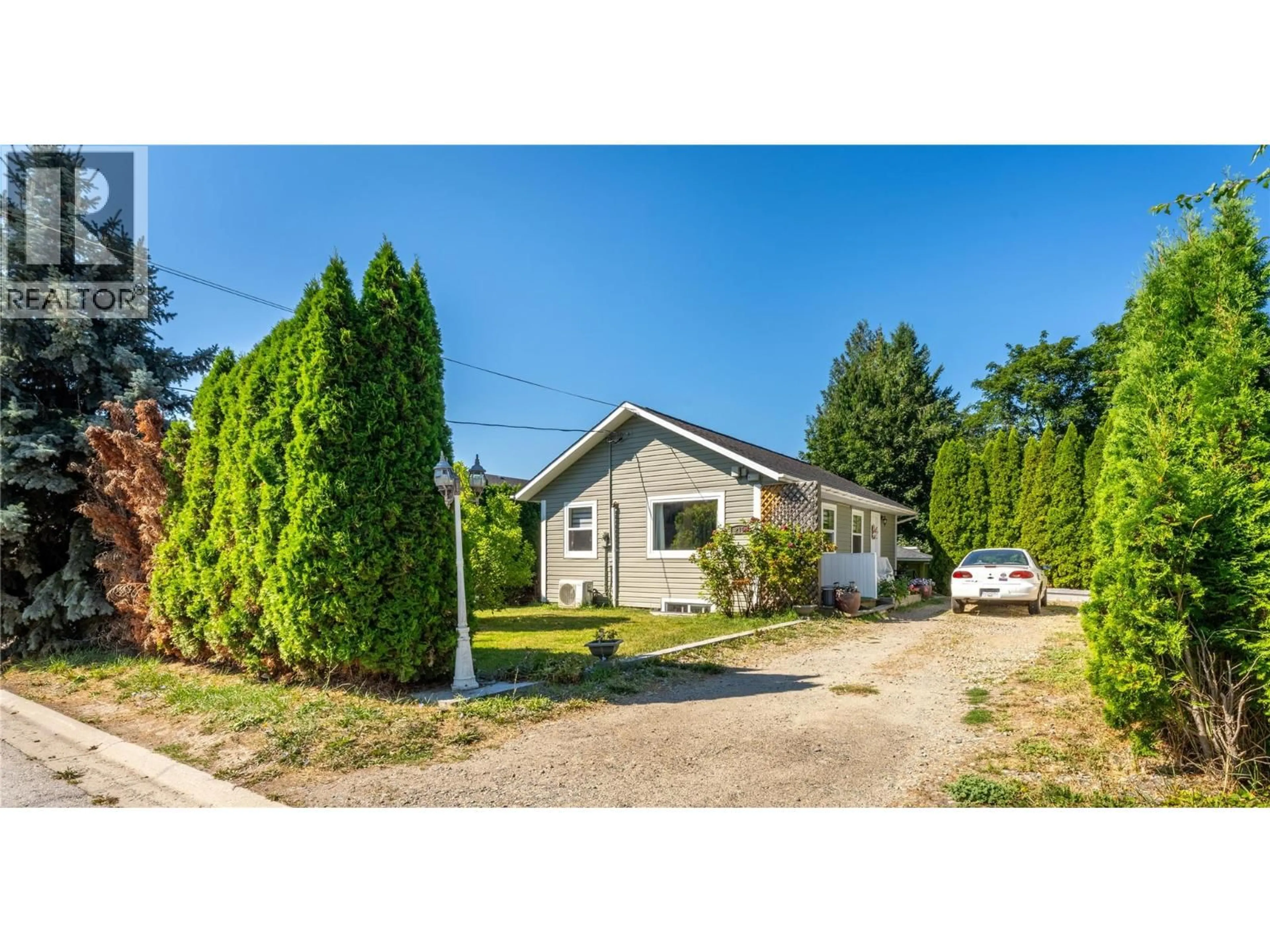 A pic from outside/outdoor area/front of a property/back of a property/a pic from drone, street for 215 19TH AVENUE SOUTH, Creston British Columbia V0B1G5