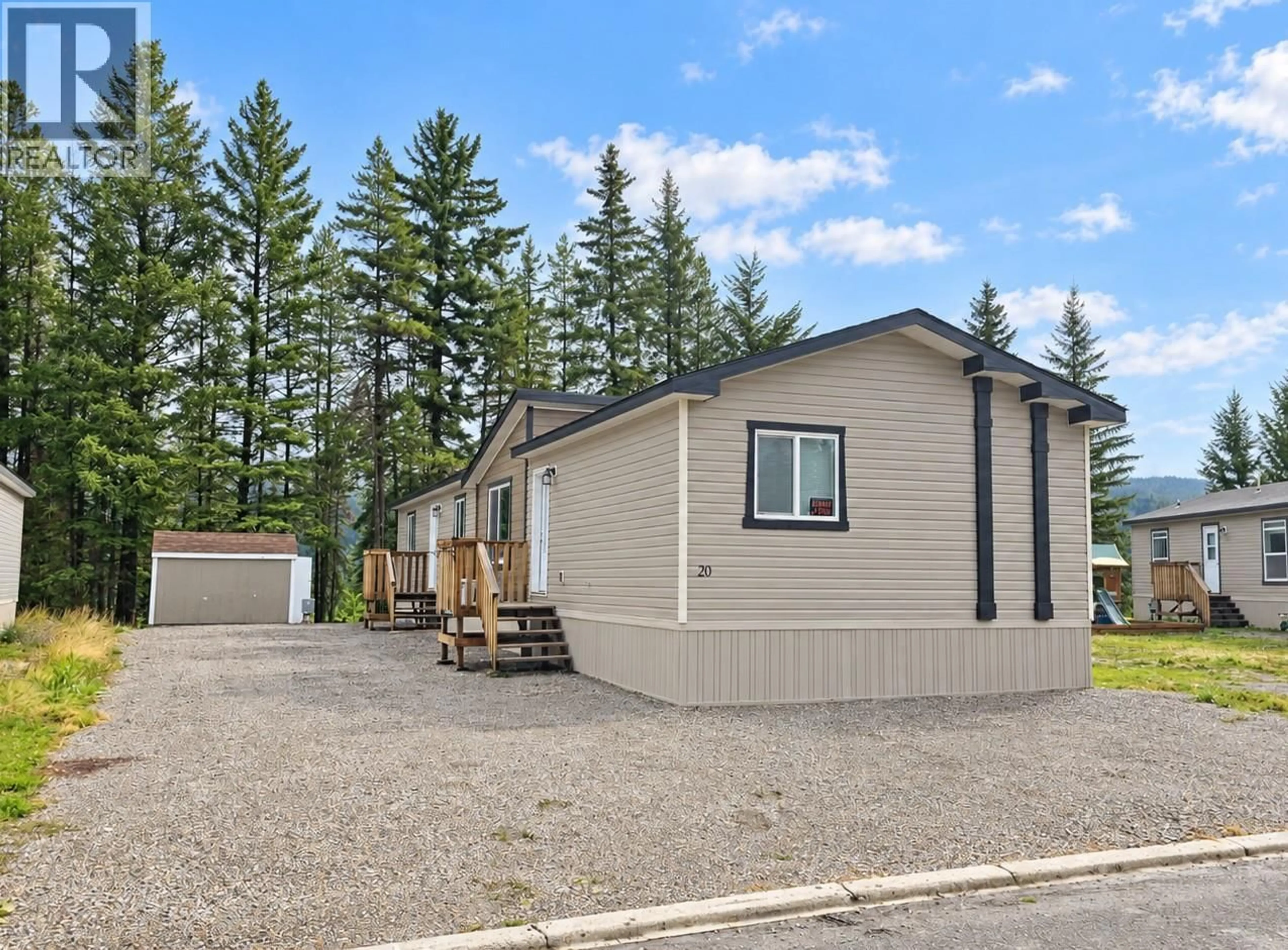 Home with vinyl exterior material, street for 20 WILDERNESS HEIGHTS DRIVE, Elkford British Columbia V0B1H0