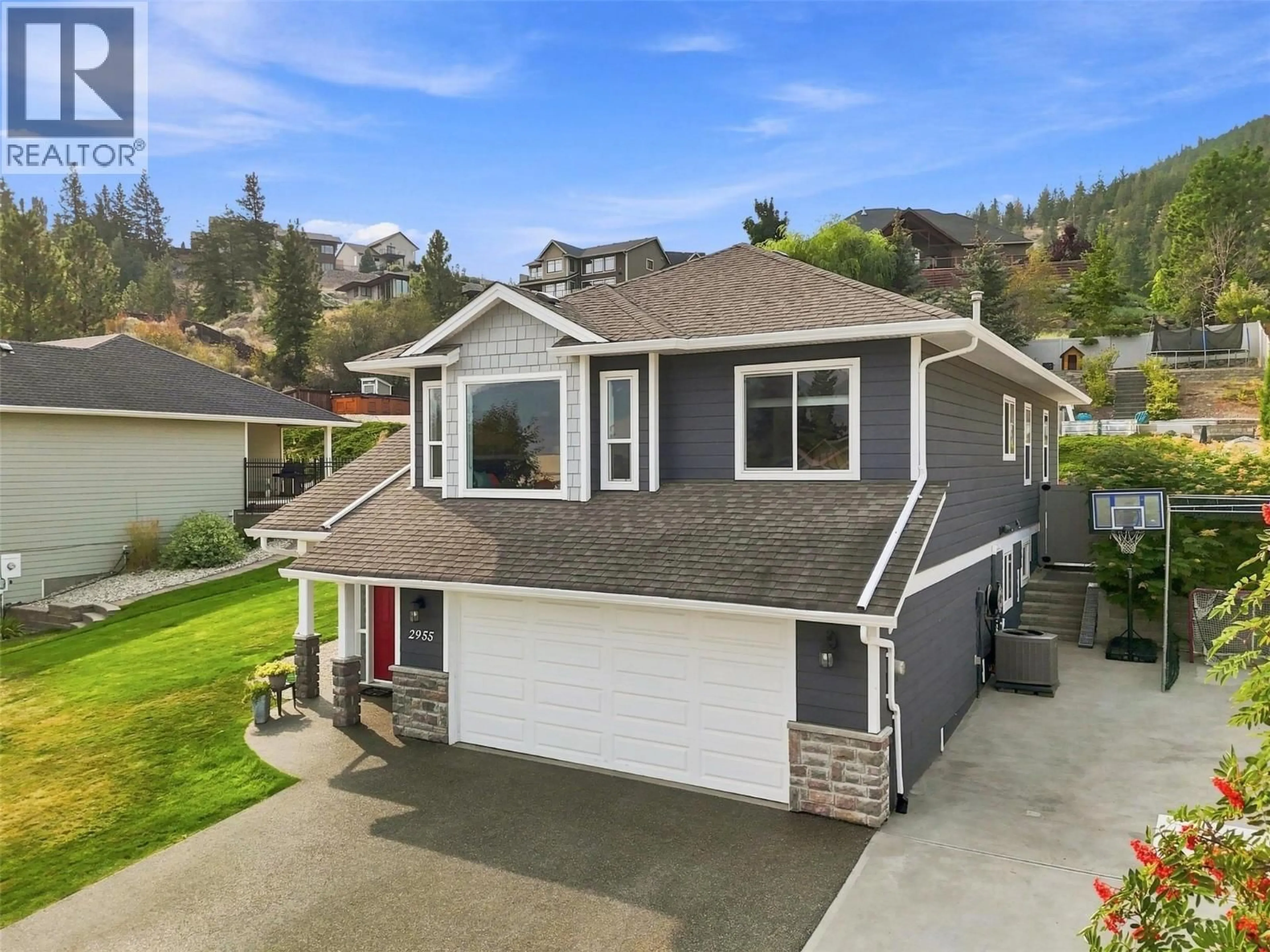 Home with vinyl exterior material, street for 2955 KICKING HORSE DRIVE, Kamloops British Columbia V2E2L8