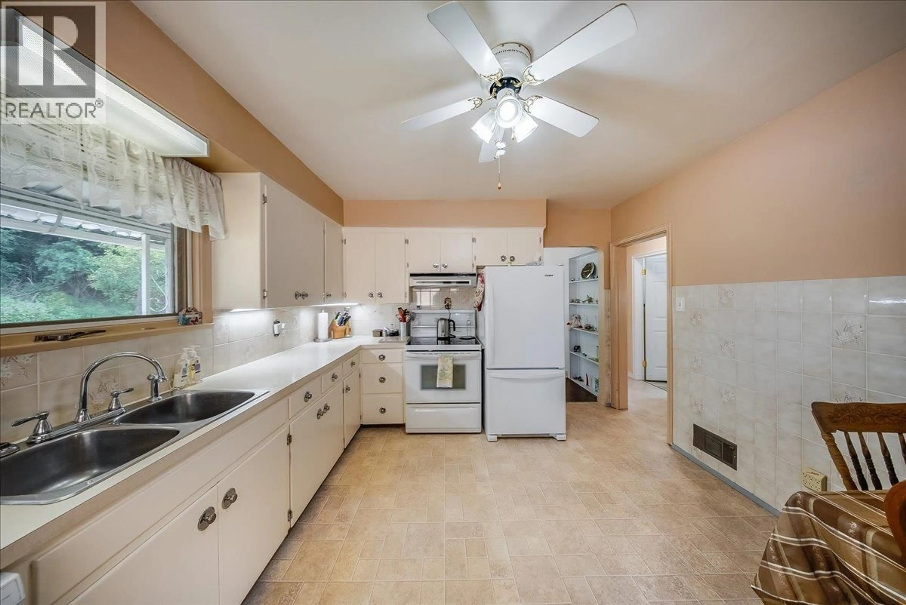 Standard kitchen, ceramic/tile floor for 141 COLLEY STREET, Warfield British Columbia V1R2M3