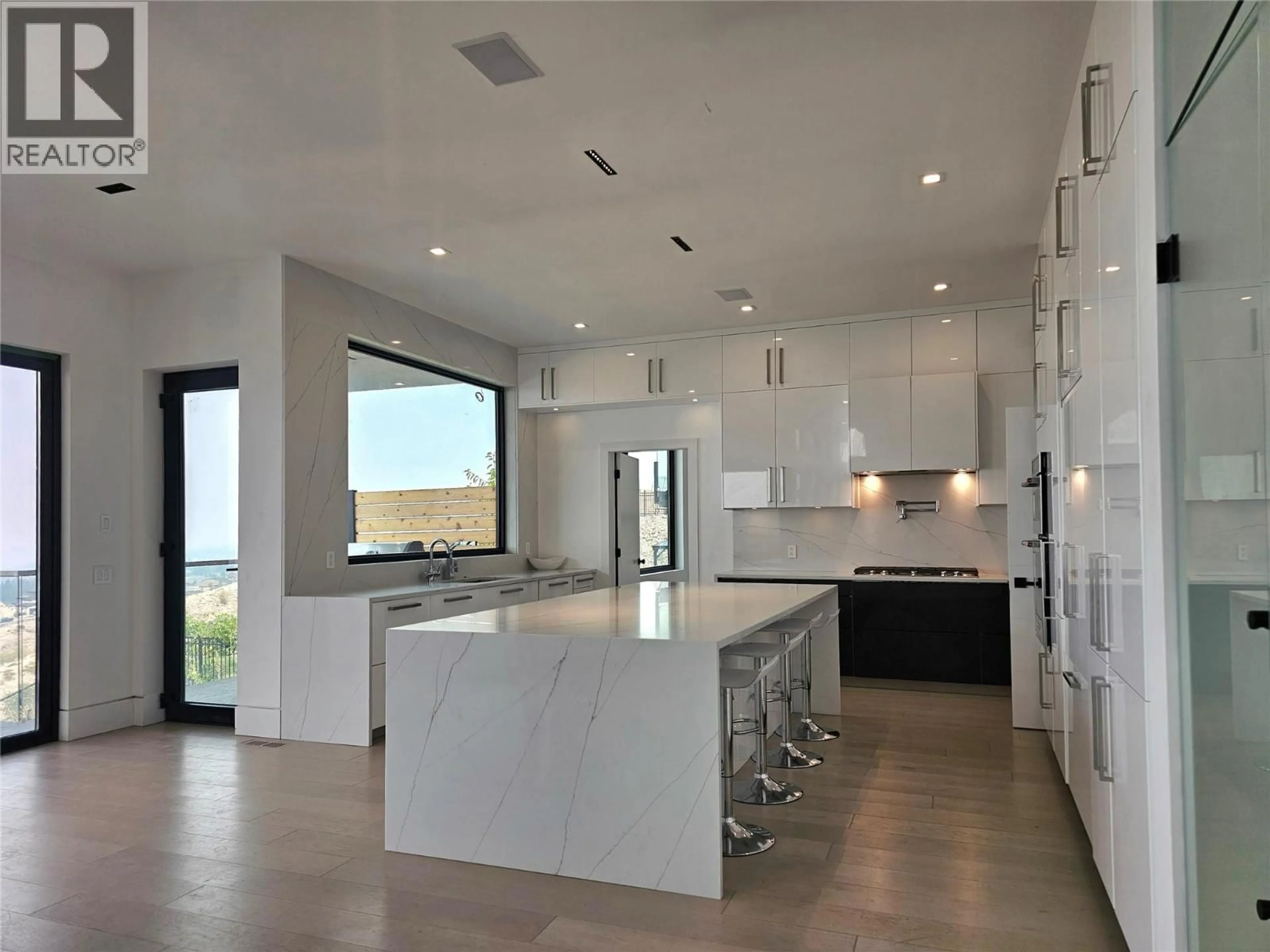 Contemporary kitchen, ceramic/tile floor for 446 REDTAIL COURT, Kelowna British Columbia V1W0B1