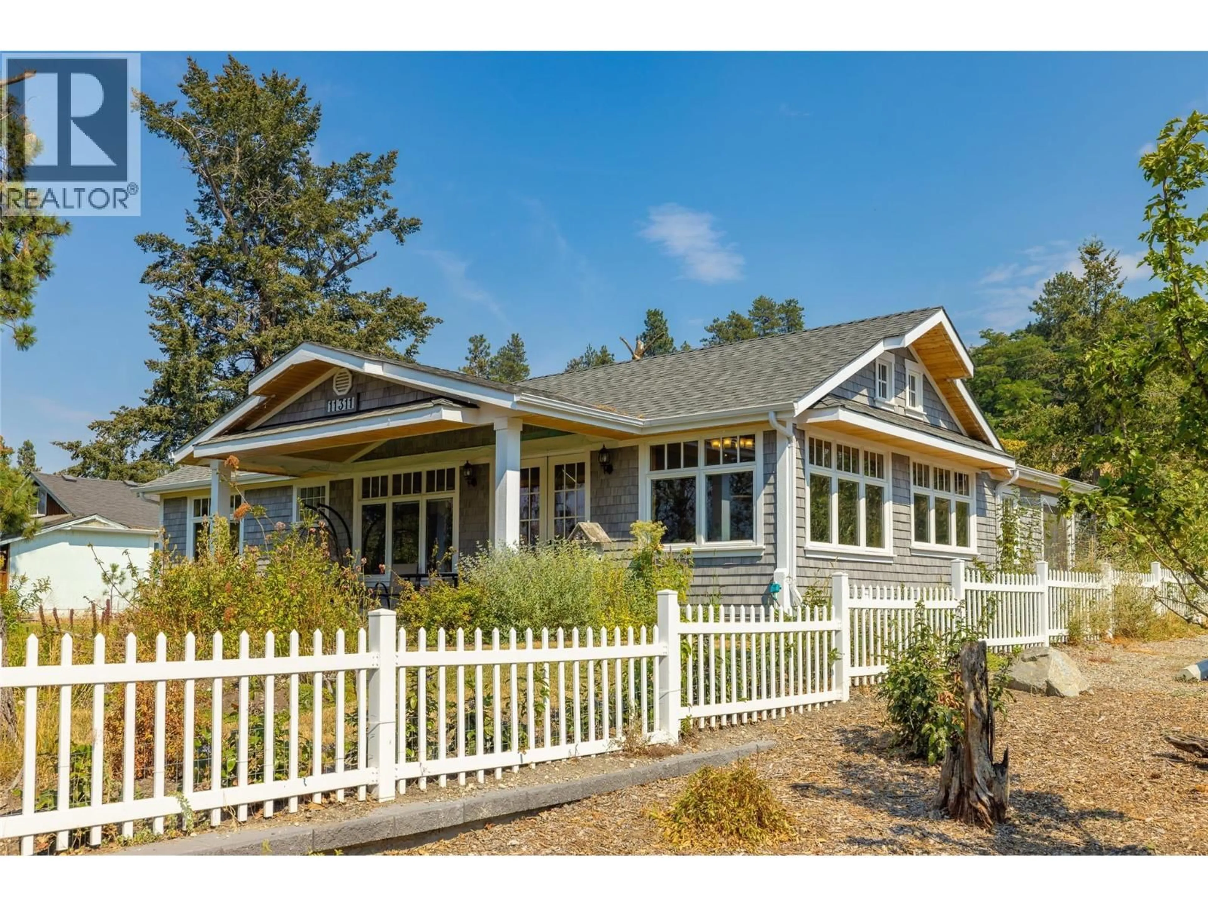 Home with vinyl exterior material, unknown for 11311 OKANAGAN CENTRE ROAD WEST, Lake Country British Columbia V4V2J6