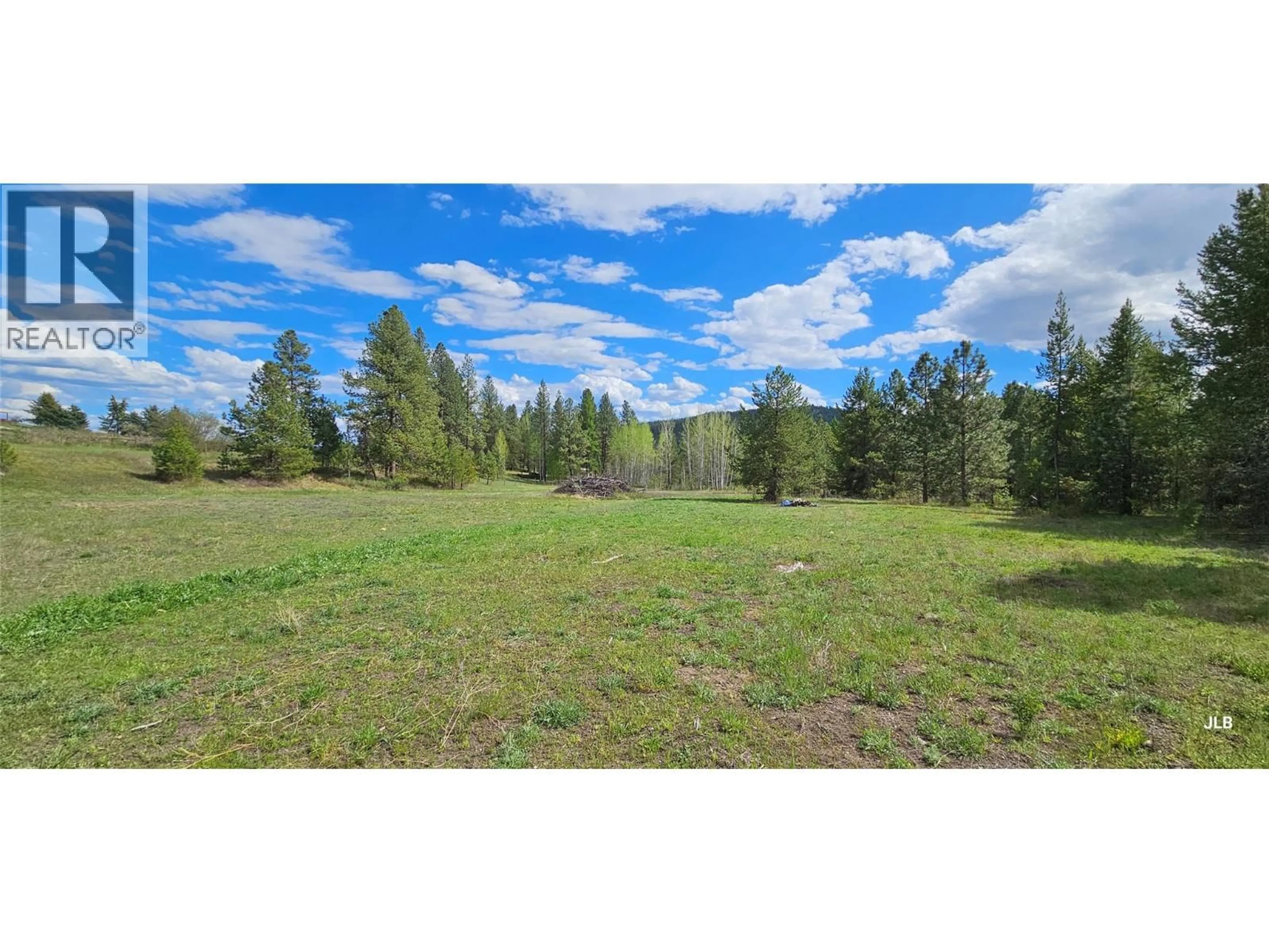 A pic from outside/outdoor area/front of a property/back of a property/a pic from drone, forest/trees view for 5335 CANYON ROAD, Rock Creek British Columbia V0H1Y0
