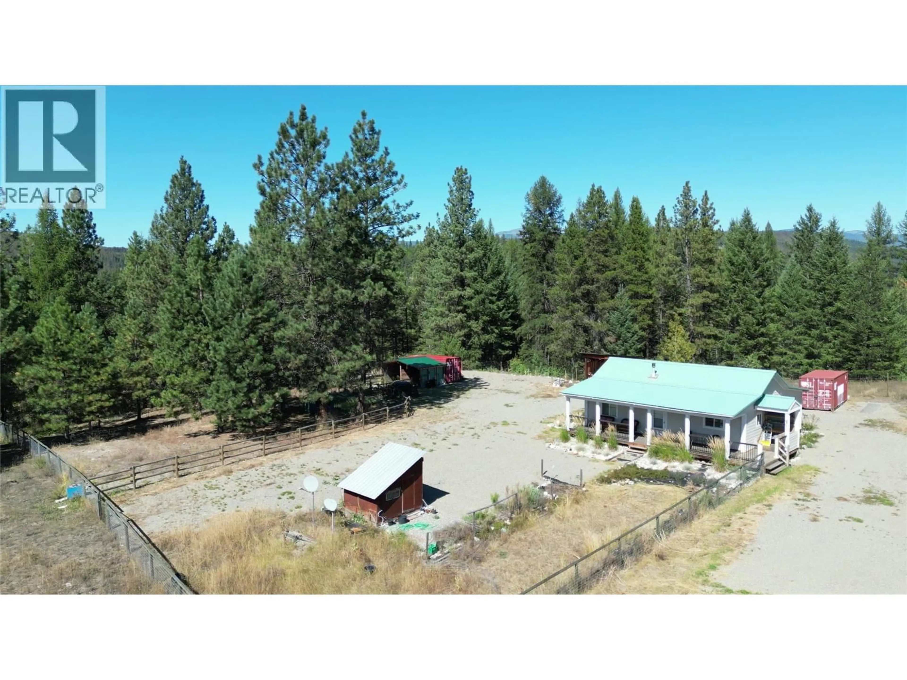 A pic from outside/outdoor area/front of a property/back of a property/a pic from drone, forest/trees view for 5335 CANYON ROAD, Rock Creek British Columbia V0H1Y0