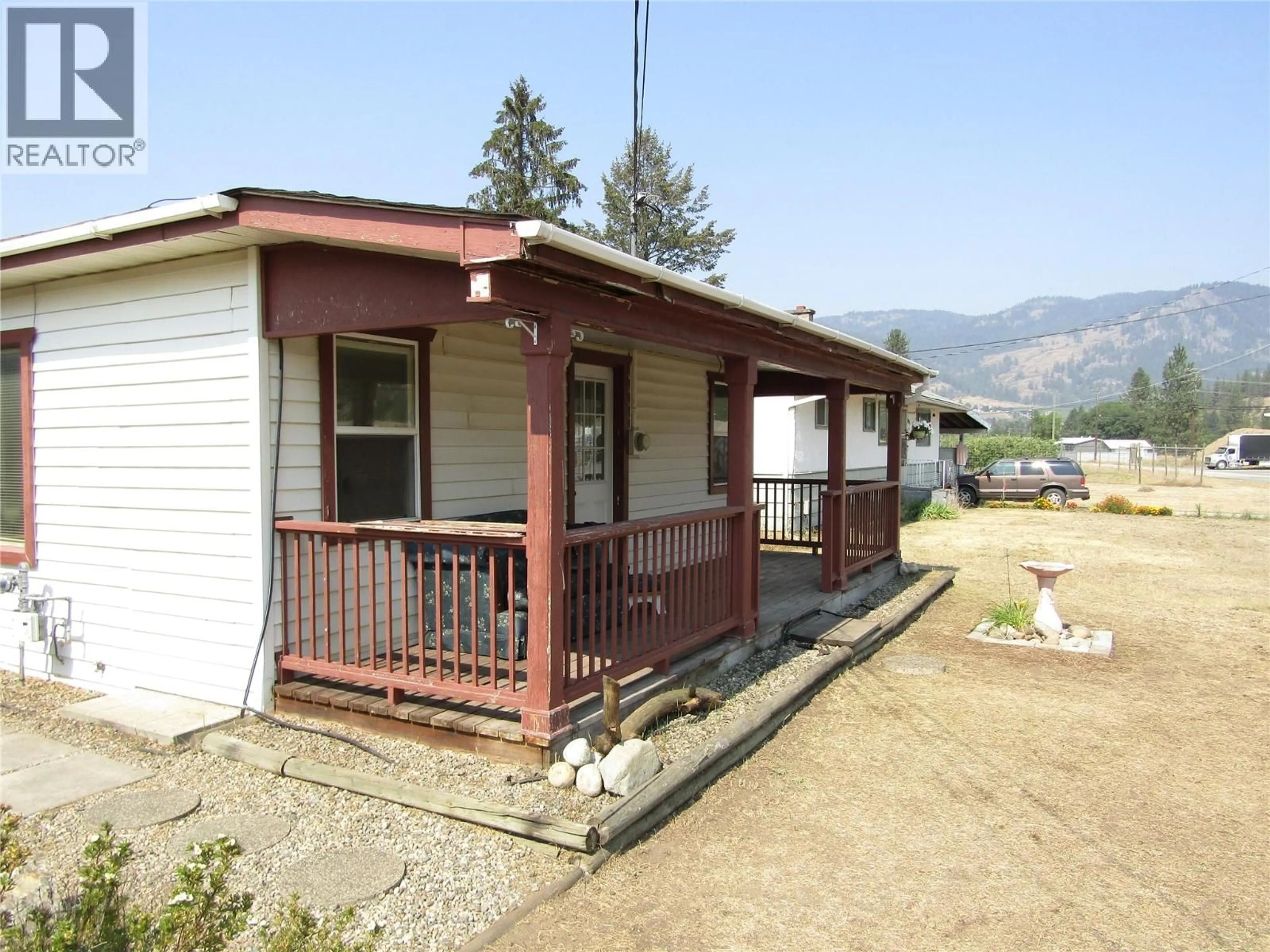 Home with vinyl exterior material, mountain view for 7843 21ST STREET, Grand Forks British Columbia V0H1H2