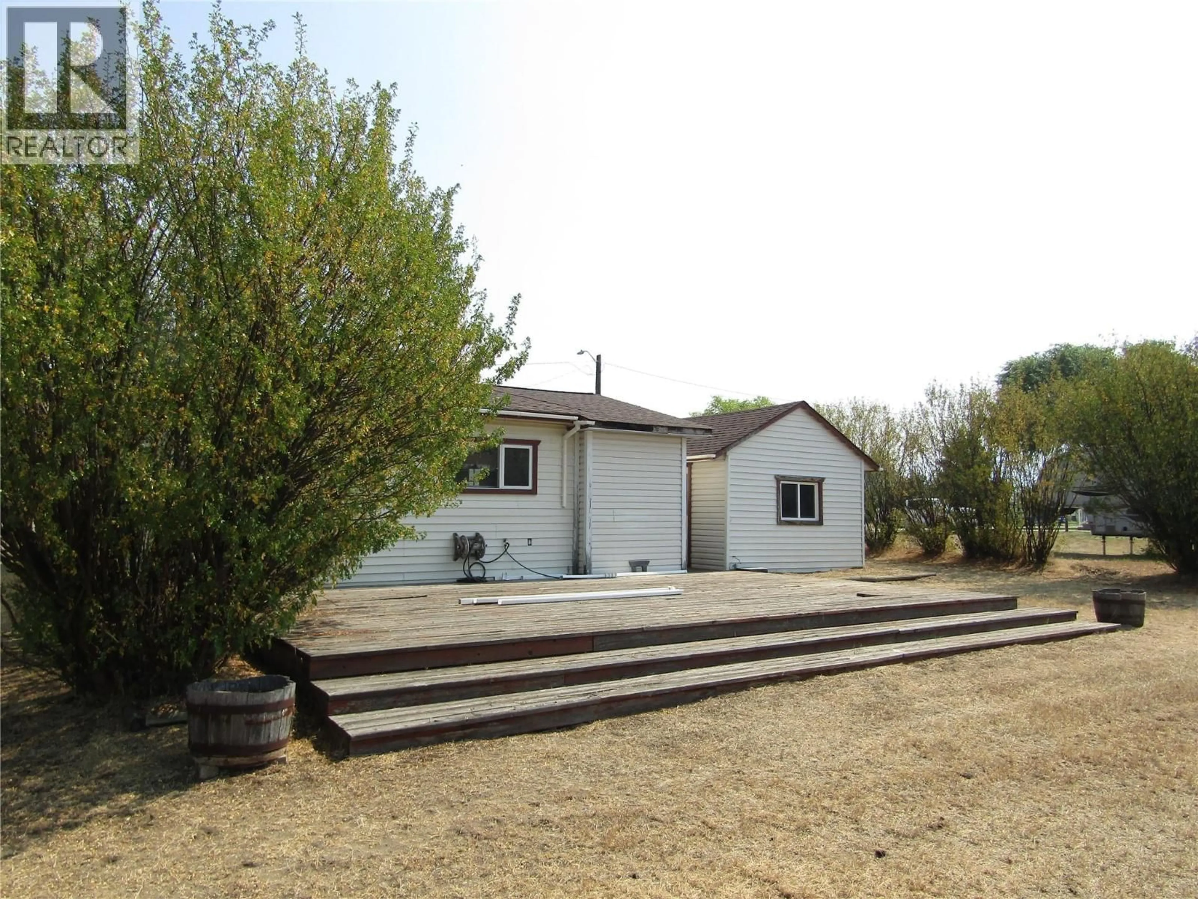 A pic from outside/outdoor area/front of a property/back of a property/a pic from drone, street for 7843 21ST STREET, Grand Forks British Columbia V0H1H2