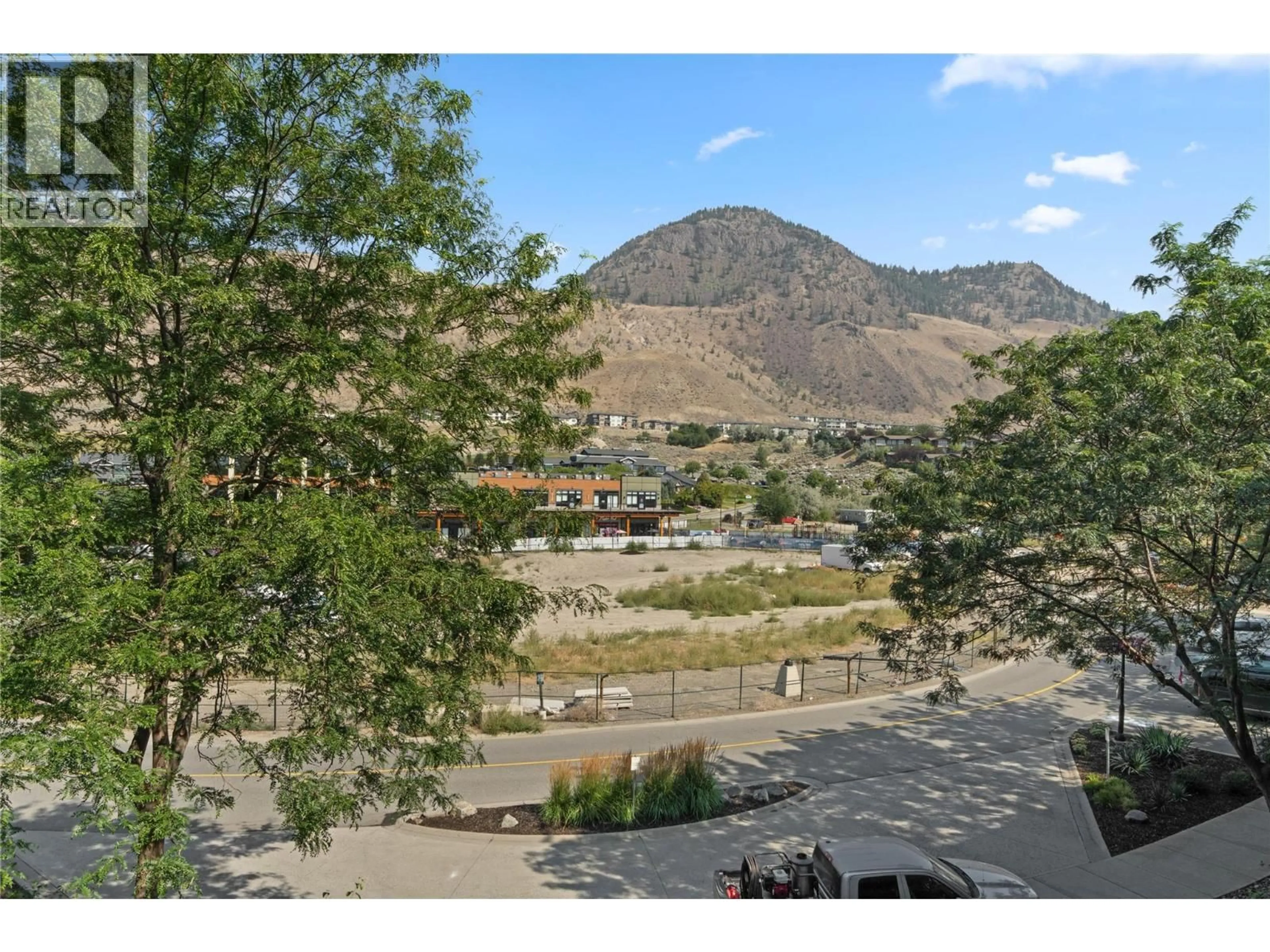 A pic from outside/outdoor area/front of a property/back of a property/a pic from drone, mountain view for 2308 - 1030 TALASA WAY, Kamloops British Columbia V2H0C3