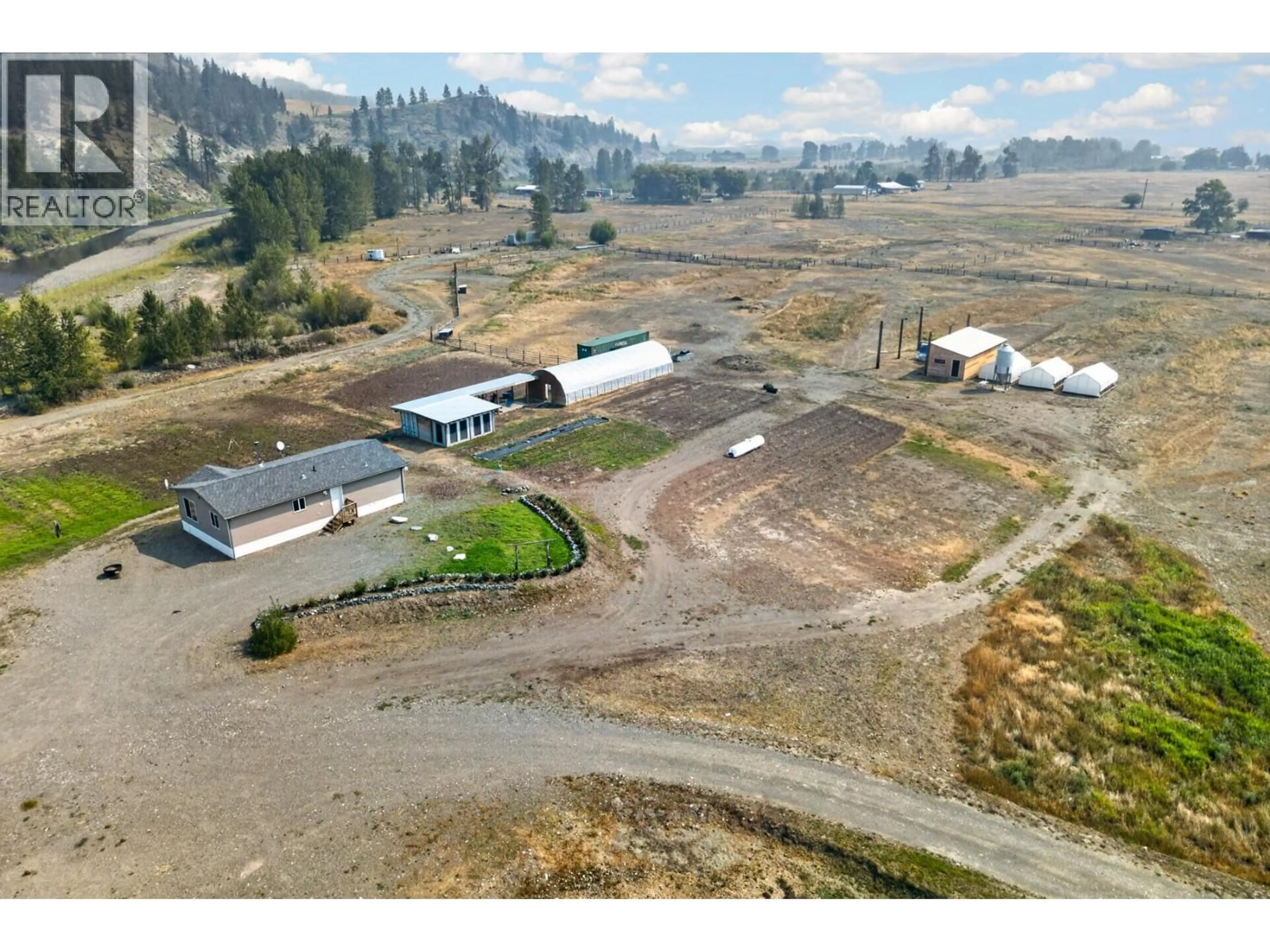 A pic from outside/outdoor area/front of a property/back of a property/a pic from drone, building for 1889 NICOLLS ROAD, Merritt British Columbia V1K1N7