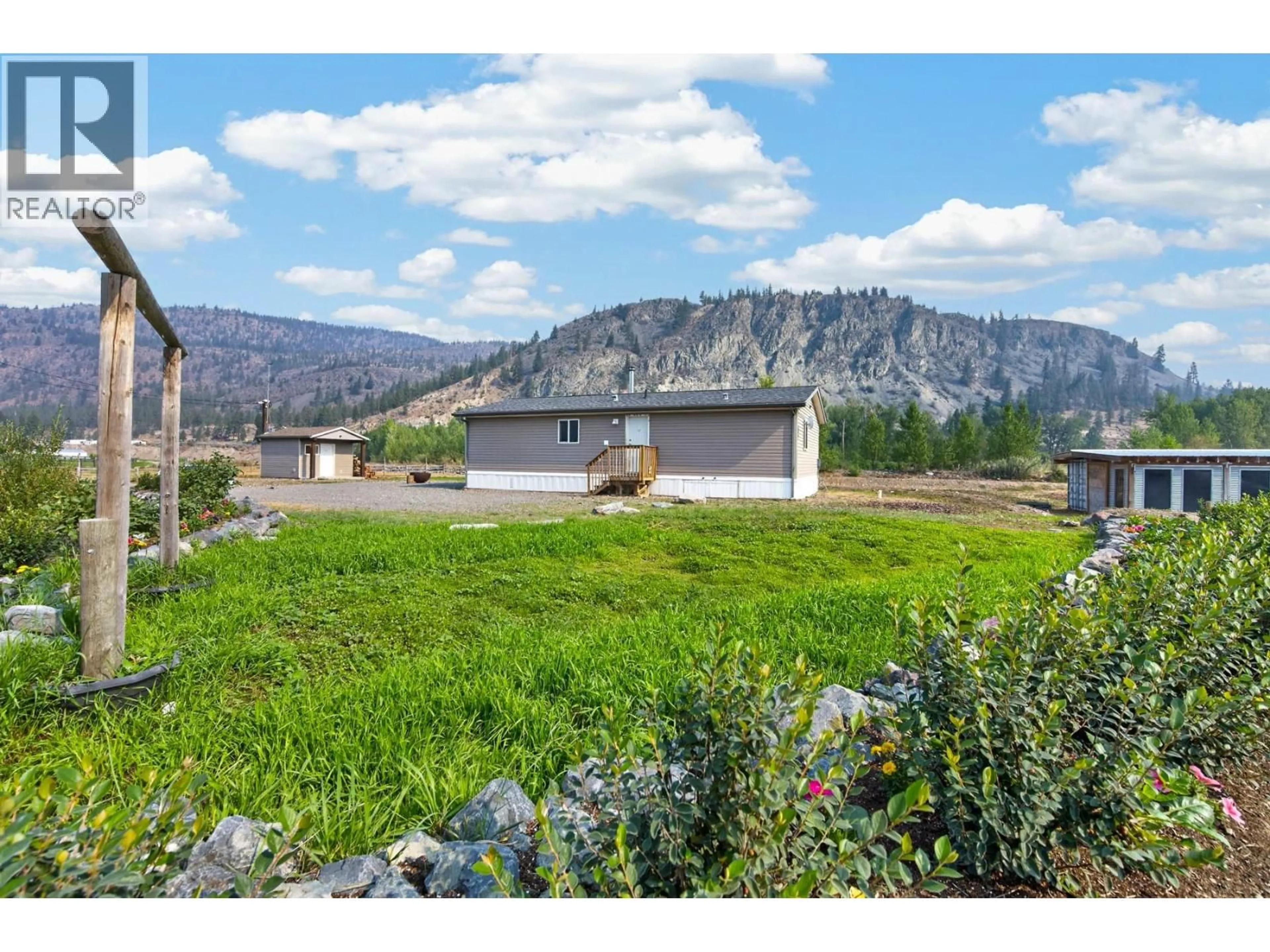 A pic from outside/outdoor area/front of a property/back of a property/a pic from drone, mountain view for 1889 NICOLLS ROAD, Merritt British Columbia V1K1N7