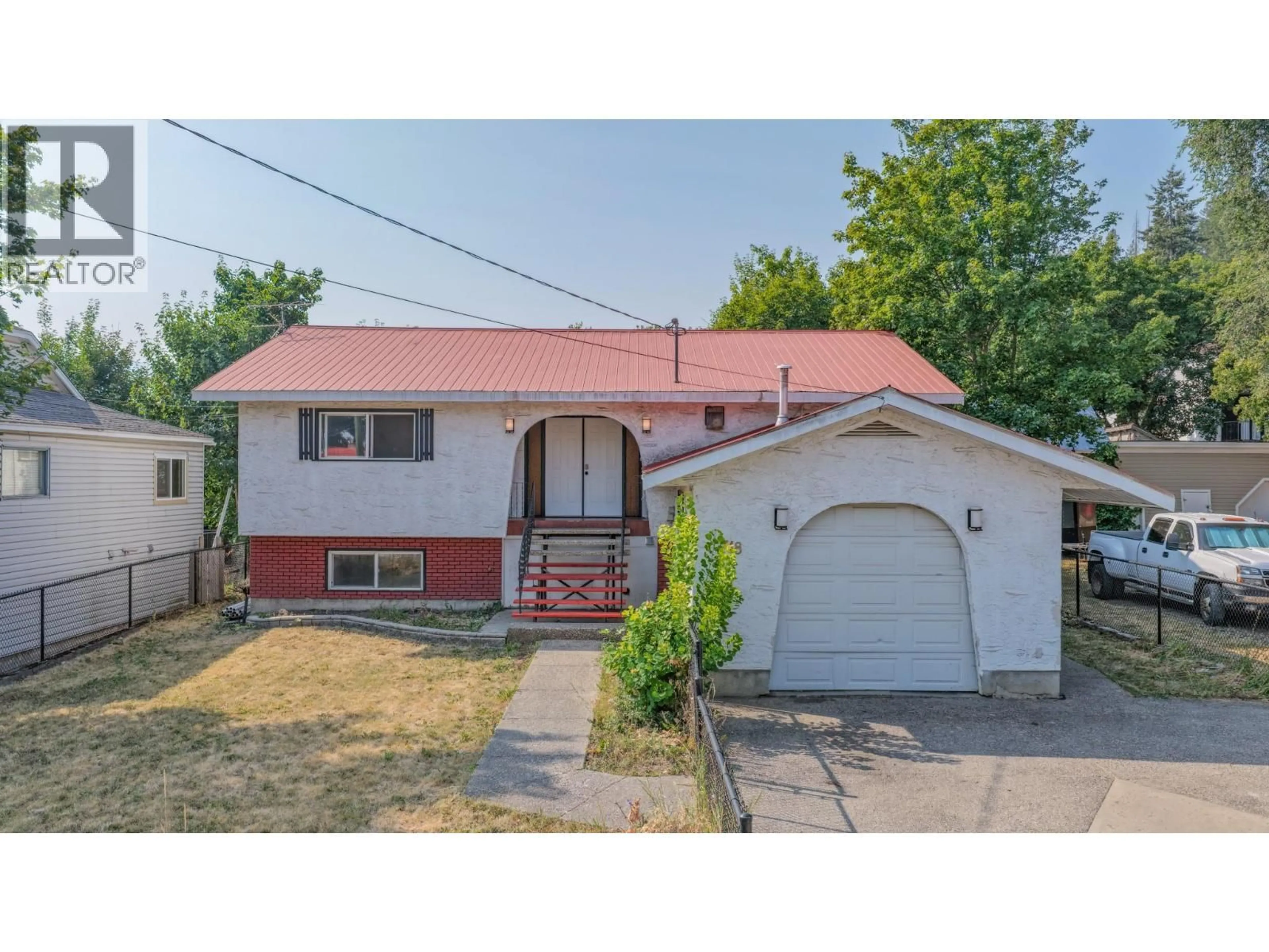 Home with vinyl exterior material, street for 718 RUSSELL AVENUE, Enderby British Columbia V0E1V0