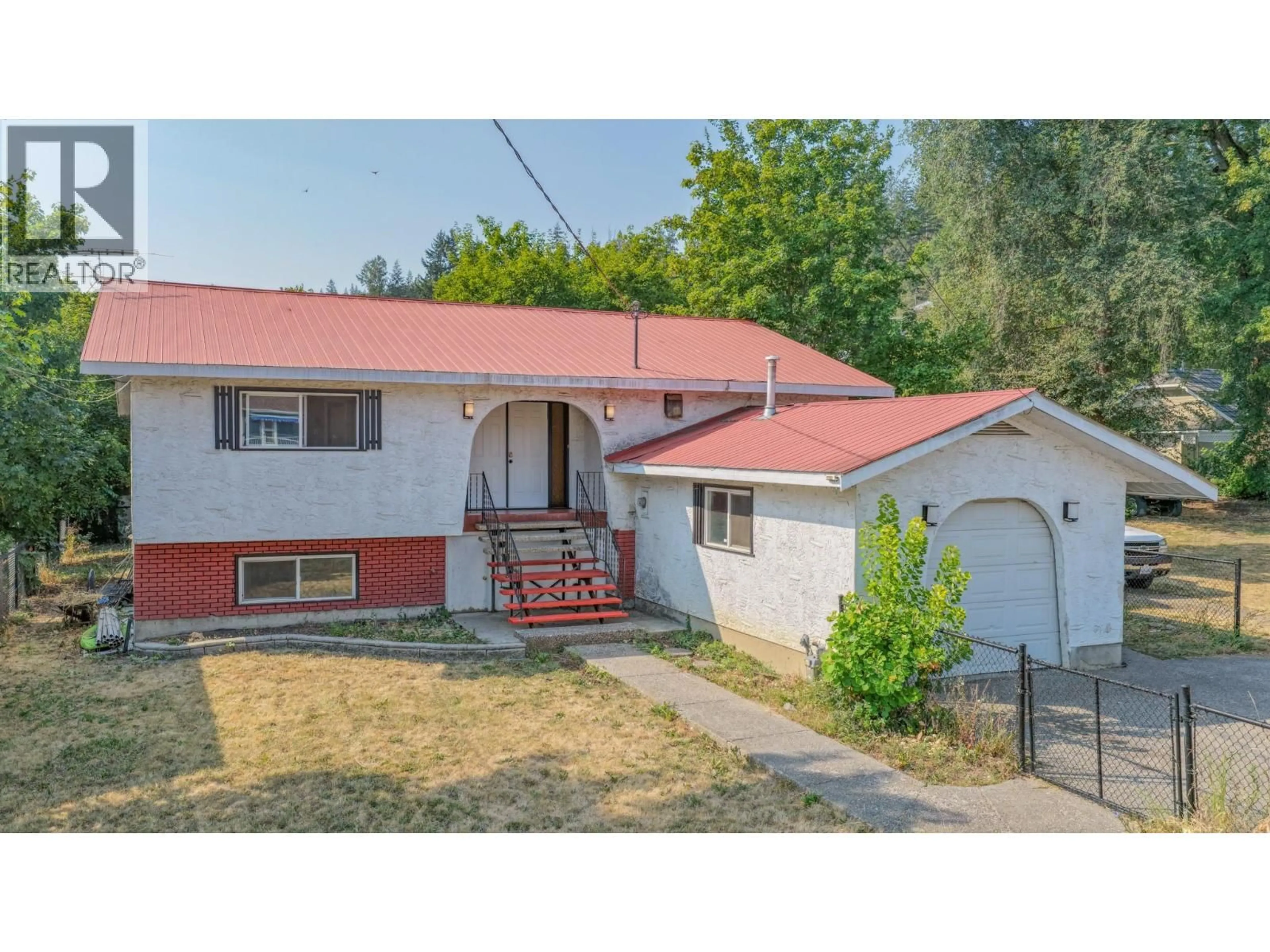 A pic from outside/outdoor area/front of a property/back of a property/a pic from drone, street for 718 RUSSELL AVENUE, Enderby British Columbia V0E1V0