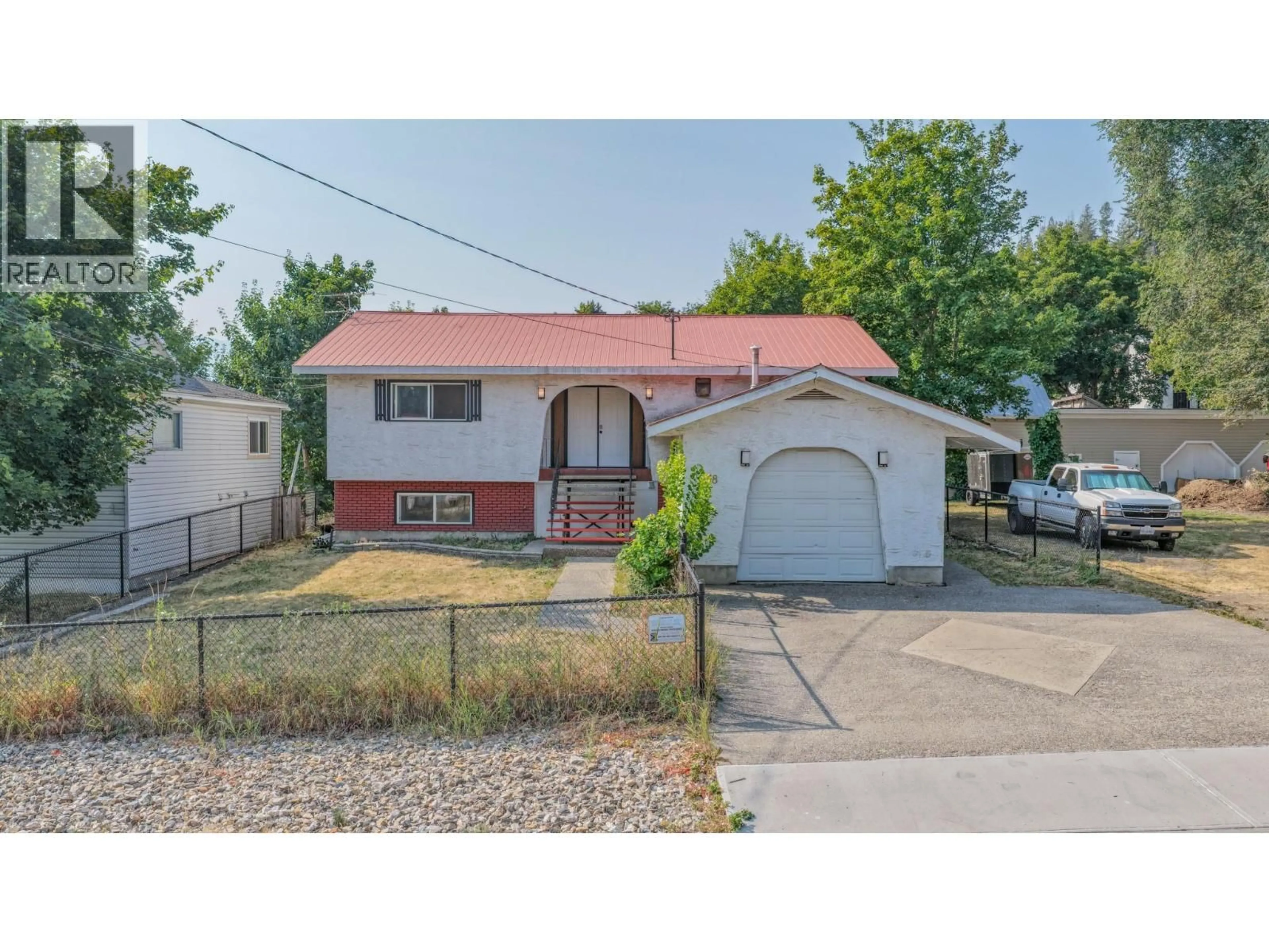 Home with vinyl exterior material, street for 718 RUSSELL AVENUE, Enderby British Columbia V0E1V0