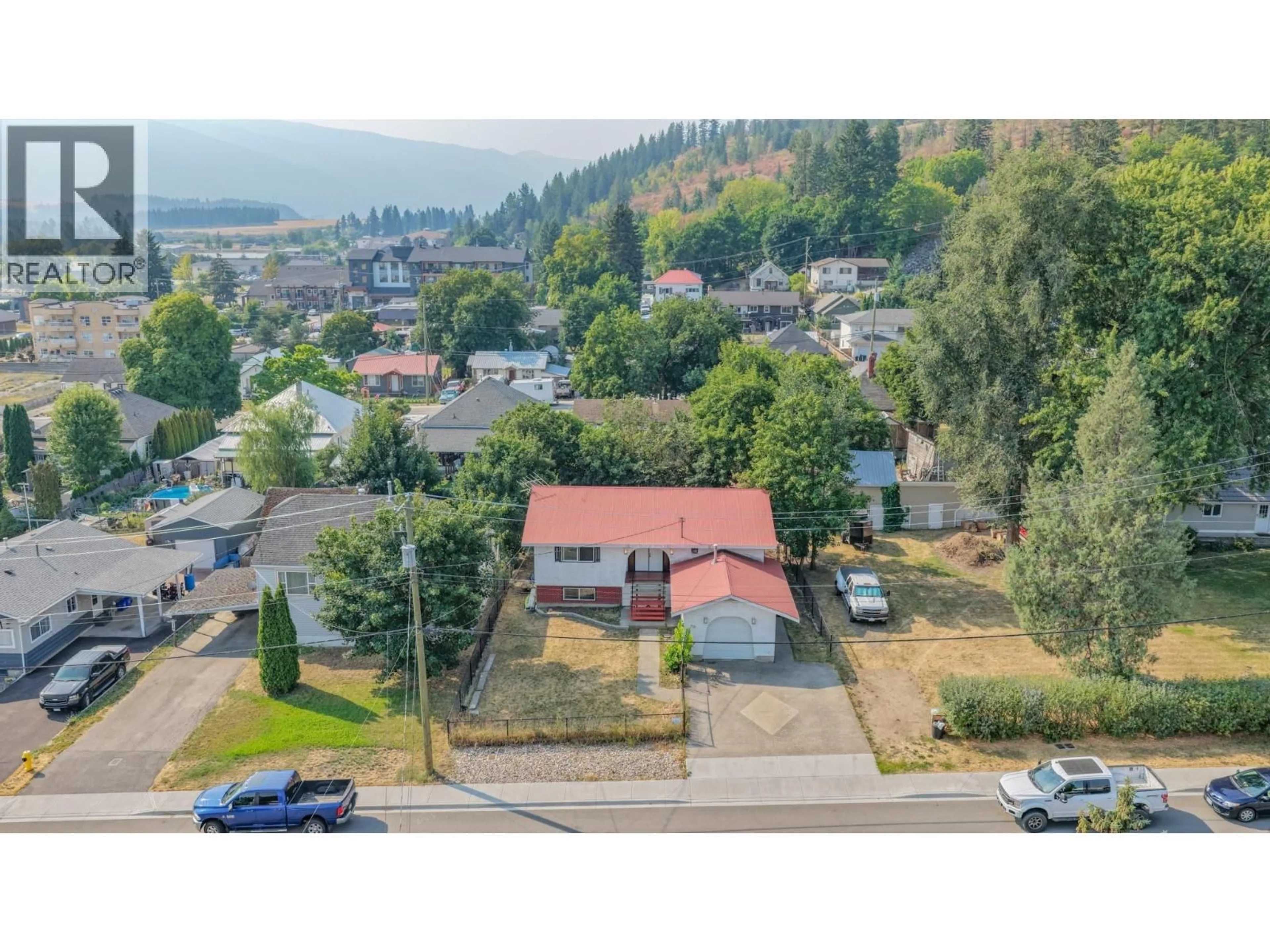 A pic from outside/outdoor area/front of a property/back of a property/a pic from drone, mountain view for 718 RUSSELL AVENUE, Enderby British Columbia V0E1V0