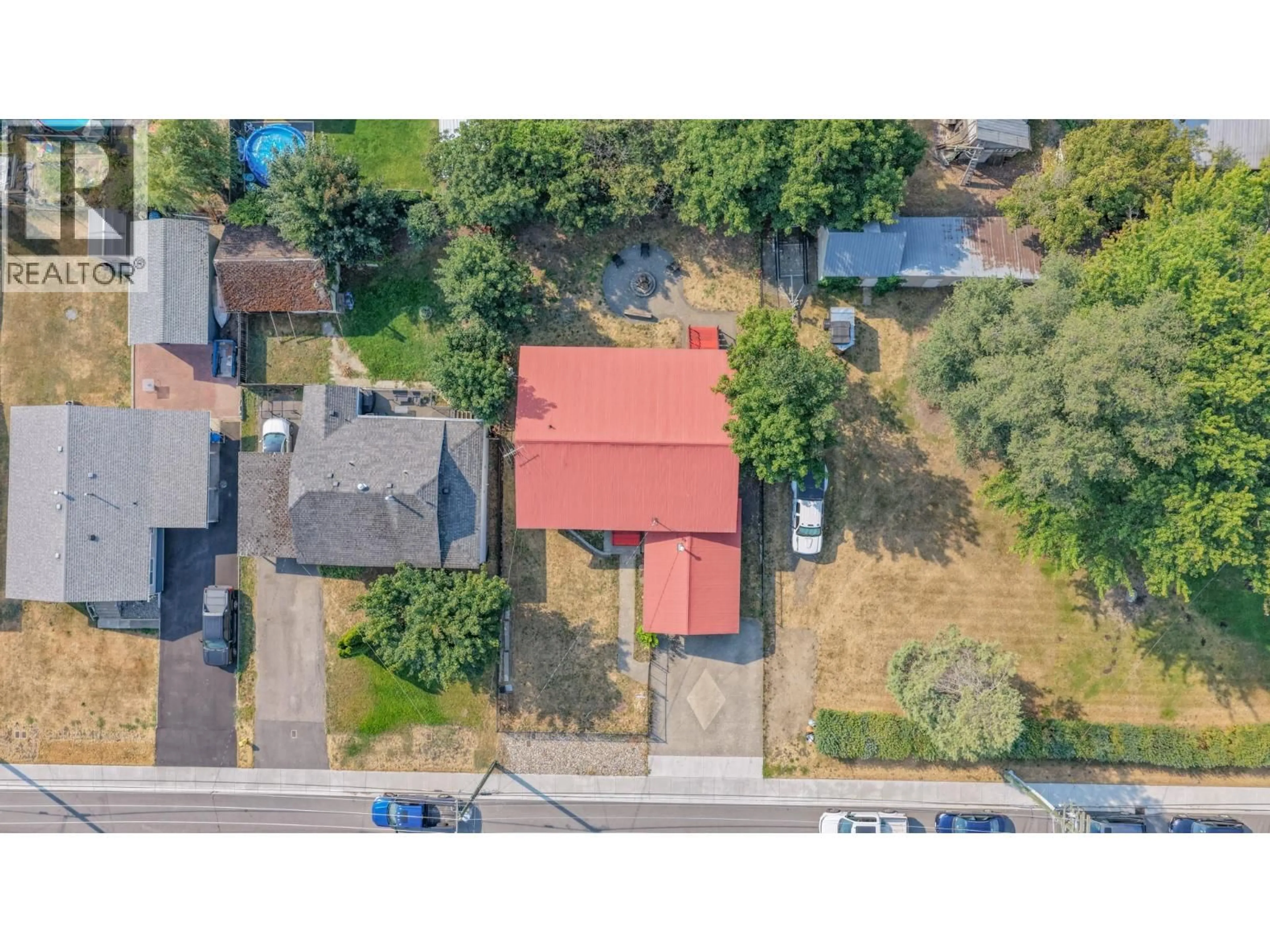A pic from outside/outdoor area/front of a property/back of a property/a pic from drone, street for 718 RUSSELL AVENUE, Enderby British Columbia V0E1V0