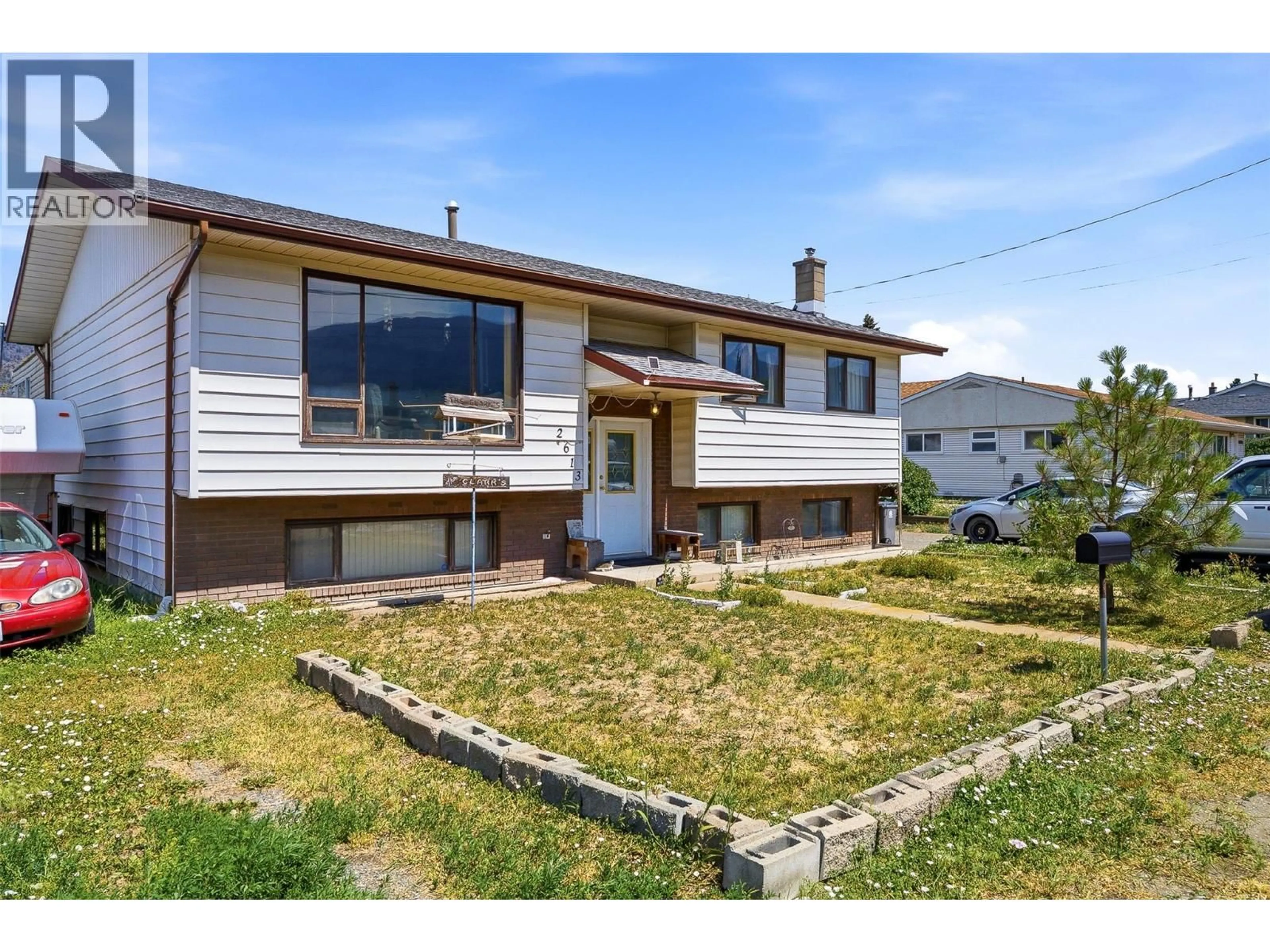Home with vinyl exterior material, street for 2613 COUTLEE AVENUE, Merritt British Columbia V1K1A9