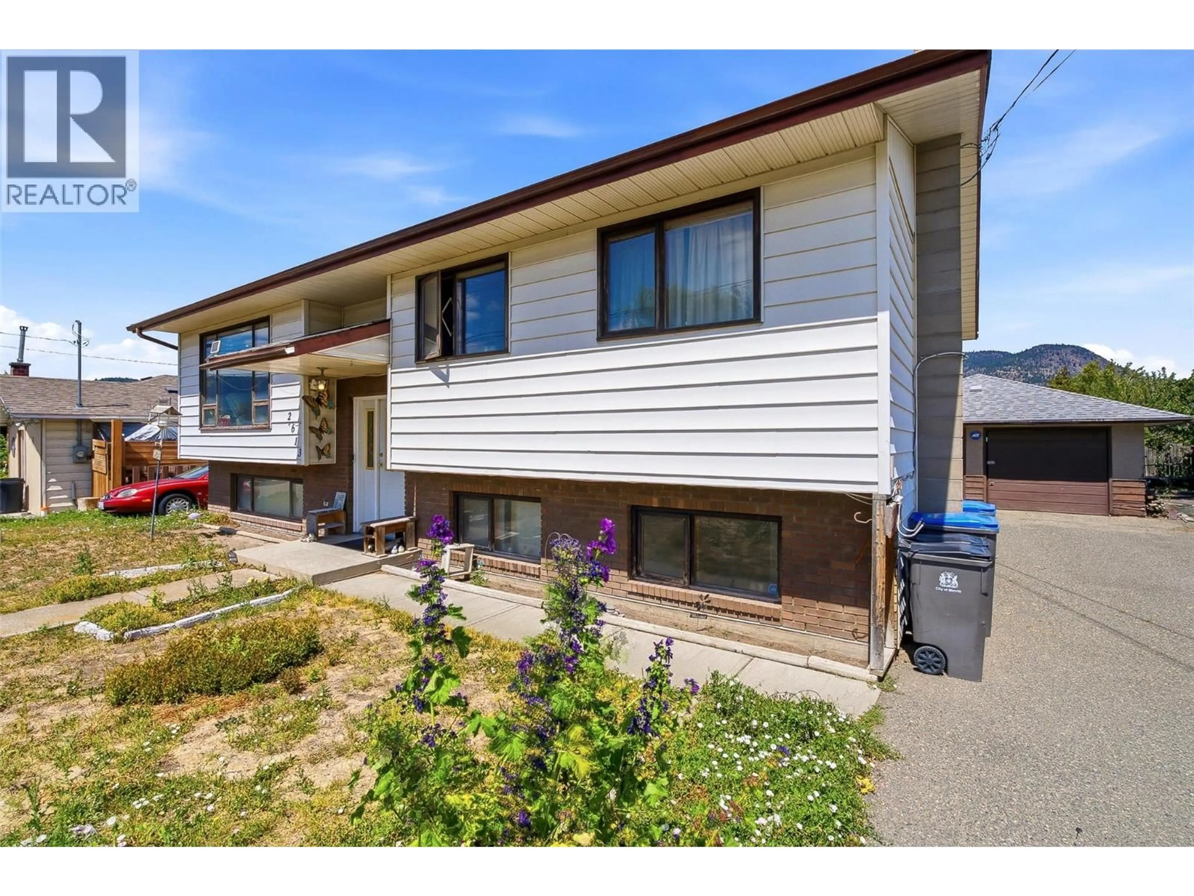 Home with vinyl exterior material, street for 2613 COUTLEE AVENUE, Merritt British Columbia V1K1A9