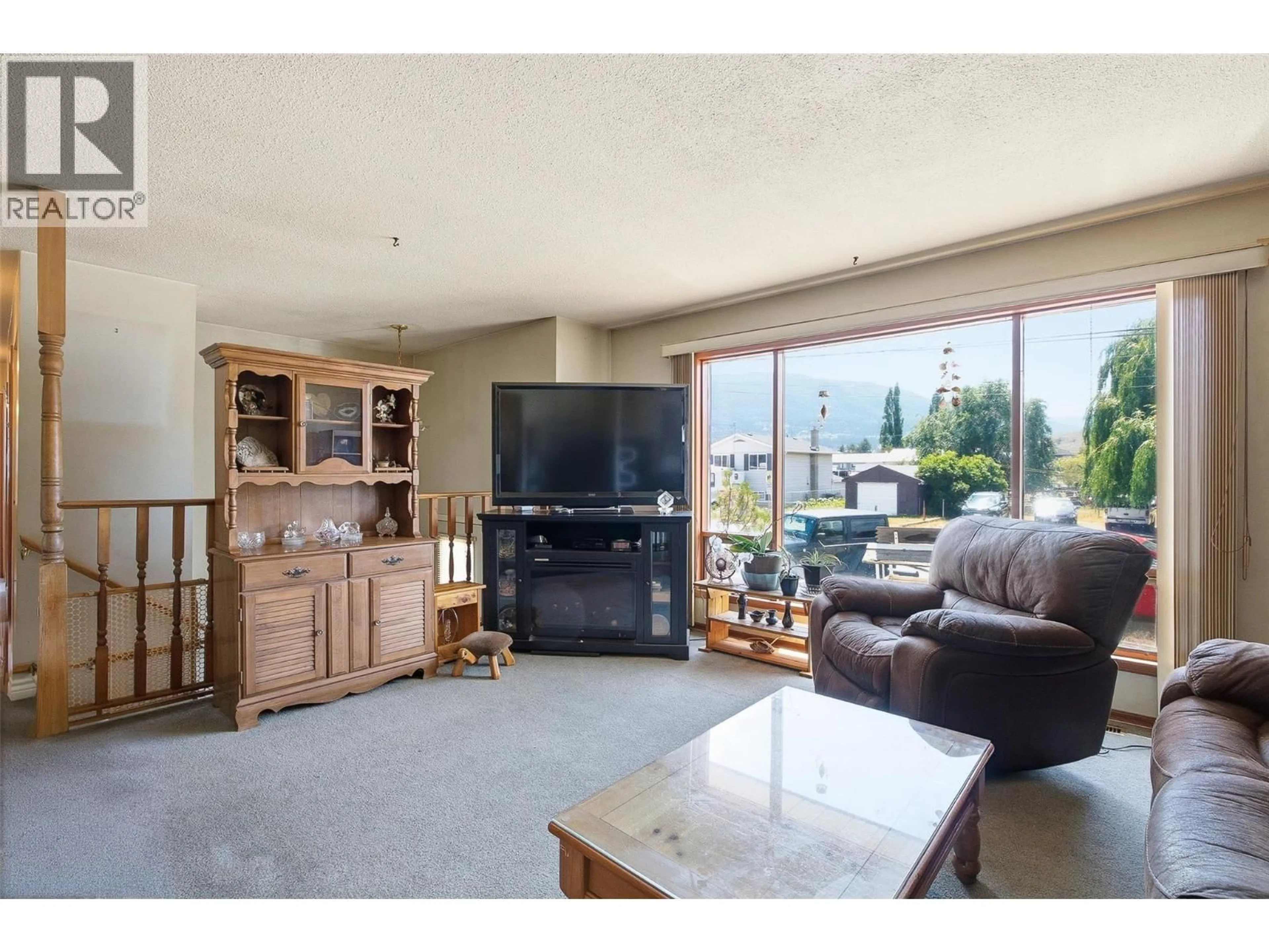 Living room with furniture, unknown for 2613 COUTLEE AVENUE, Merritt British Columbia V1K1A9