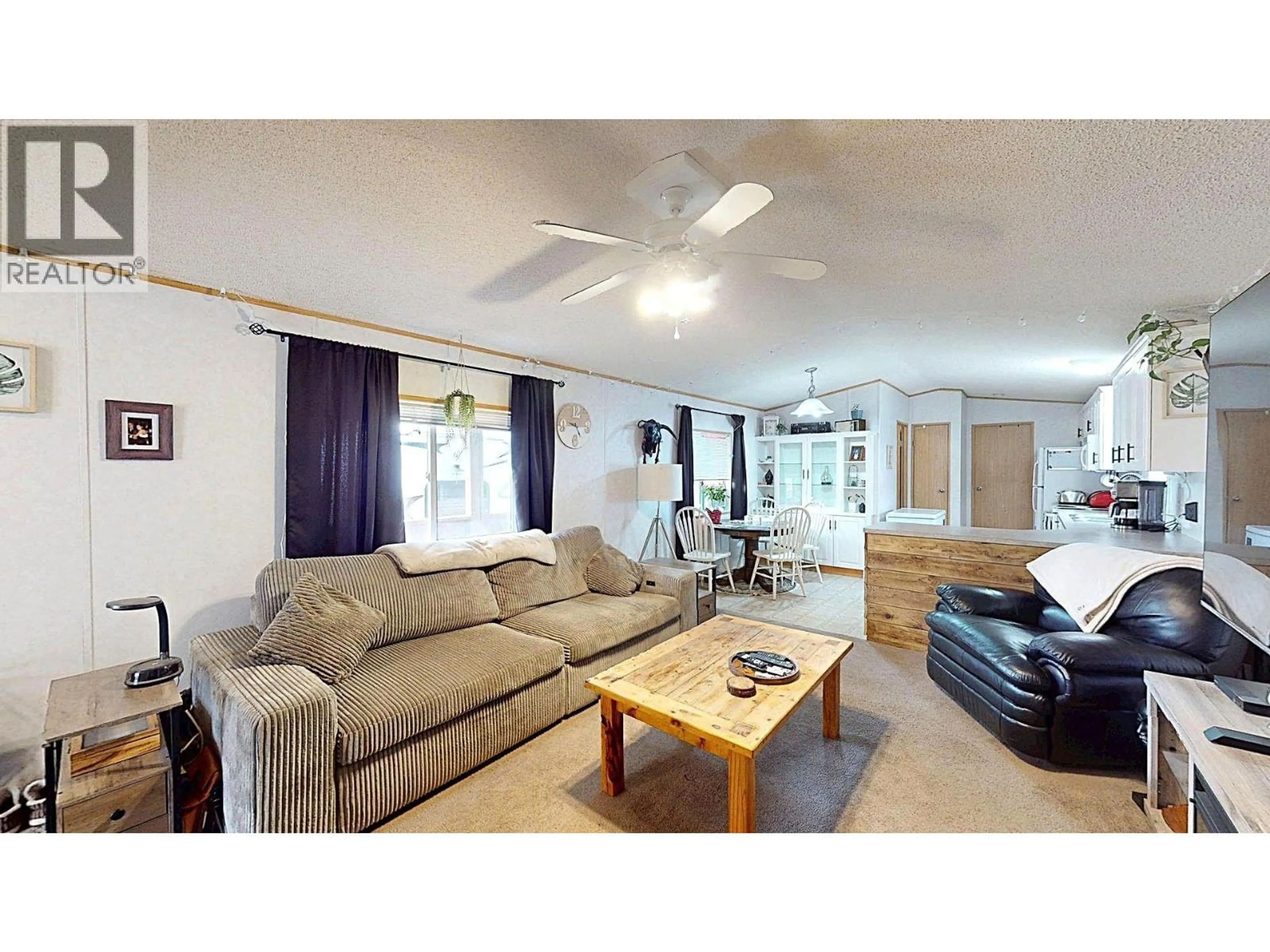 Living room with furniture, wood/laminate floor for 8 CARLING PLACE, Elkford British Columbia V0B1H0
