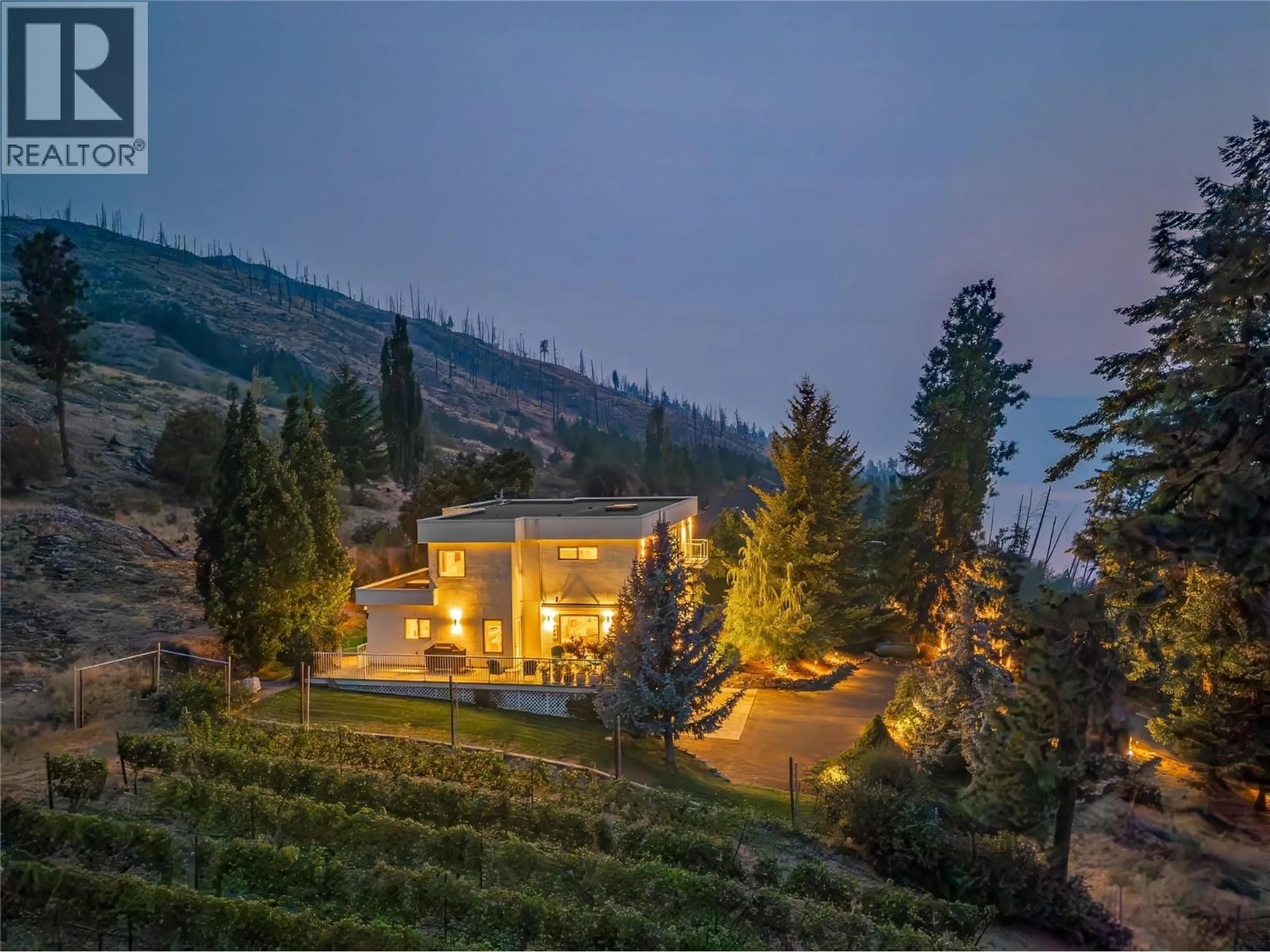 A pic from outside/outdoor area/front of a property/back of a property/a pic from drone, mountain view for 5851 LAKESHORE ROAD, Kelowna British Columbia V1W4J5