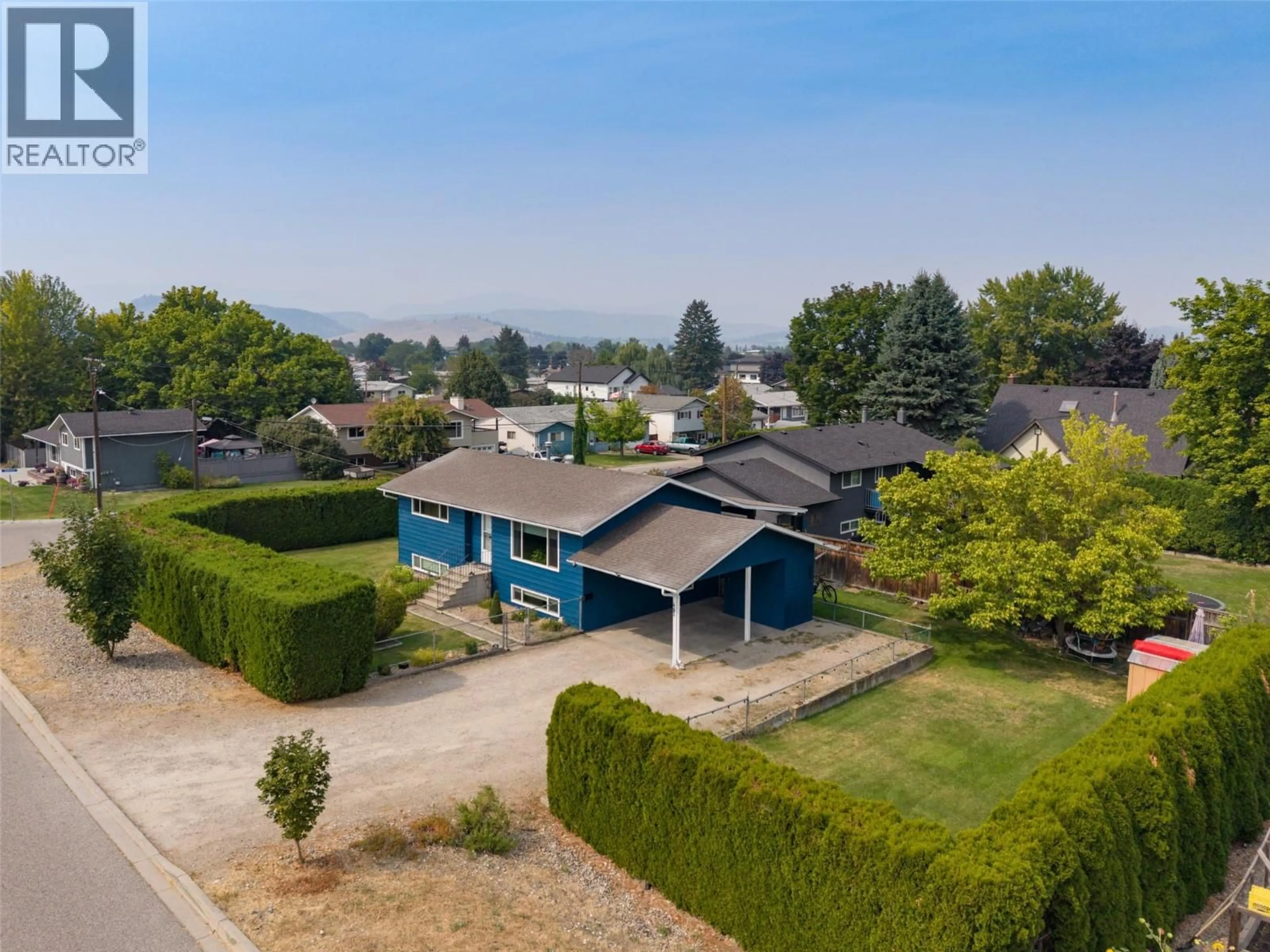 A pic from outside/outdoor area/front of a property/back of a property/a pic from drone, unknown for 680 MYRON ROAD, Kelowna British Columbia V1X5K2