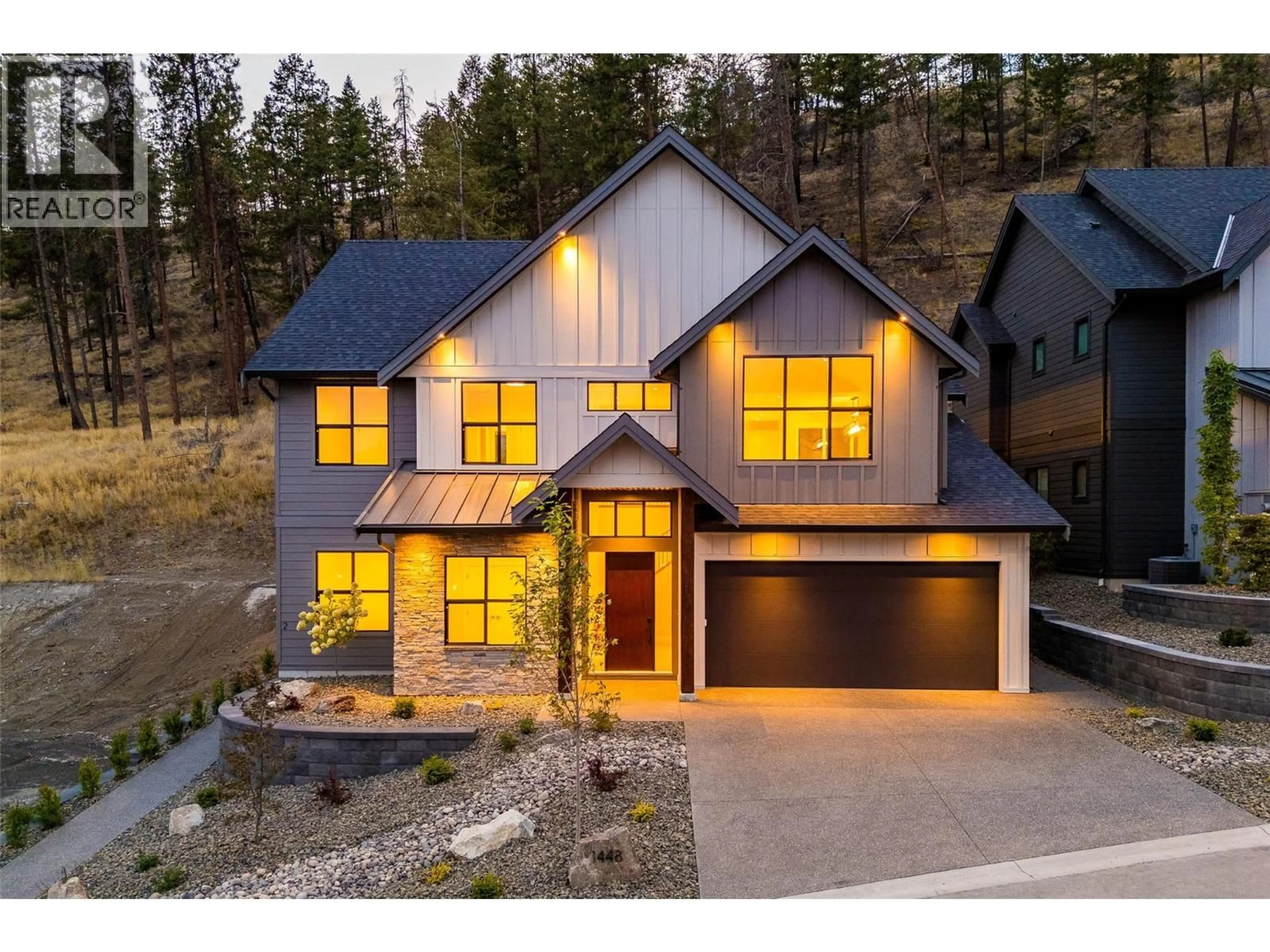 Home with brick exterior material, street for 1448 WHISTLING PINE PLACE, Kelowna British Columbia V1V1H1