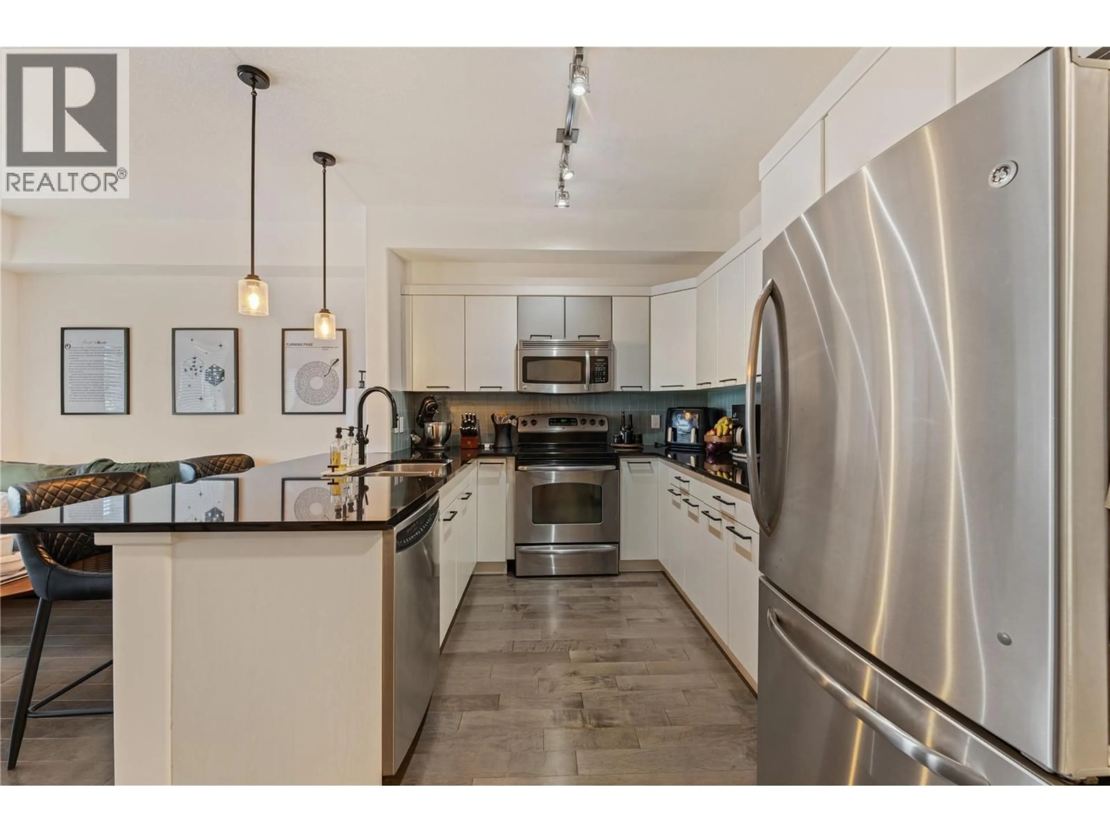 Open concept kitchen, ceramic/tile floor for 310 - 3645 CARRINGTON ROAD, West Kelowna British Columbia V4T3G9