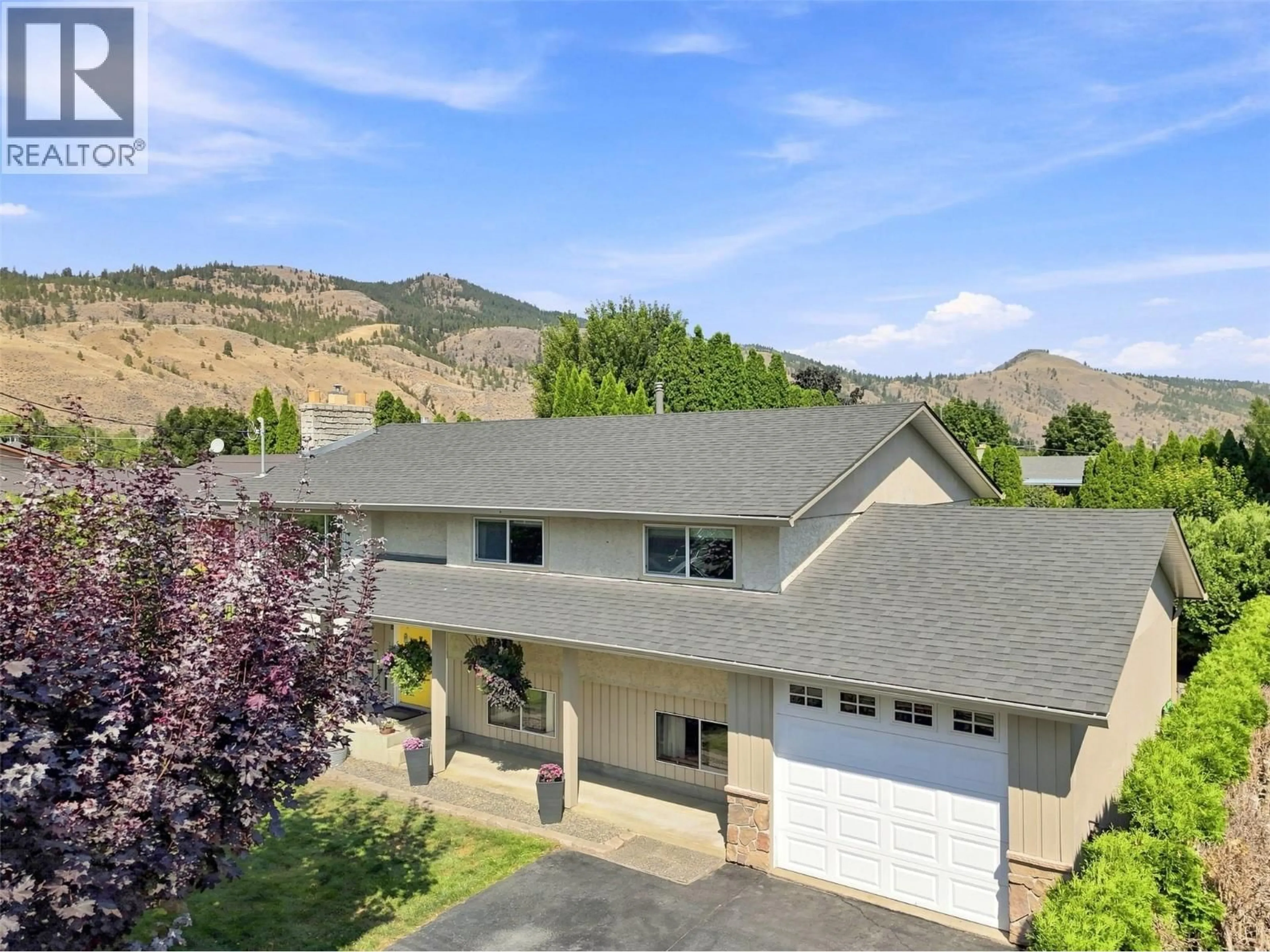 A pic from outside/outdoor area/front of a property/back of a property/a pic from drone, mountain view for 718 CLEMENTS COURT, Kamloops British Columbia V2B8C2