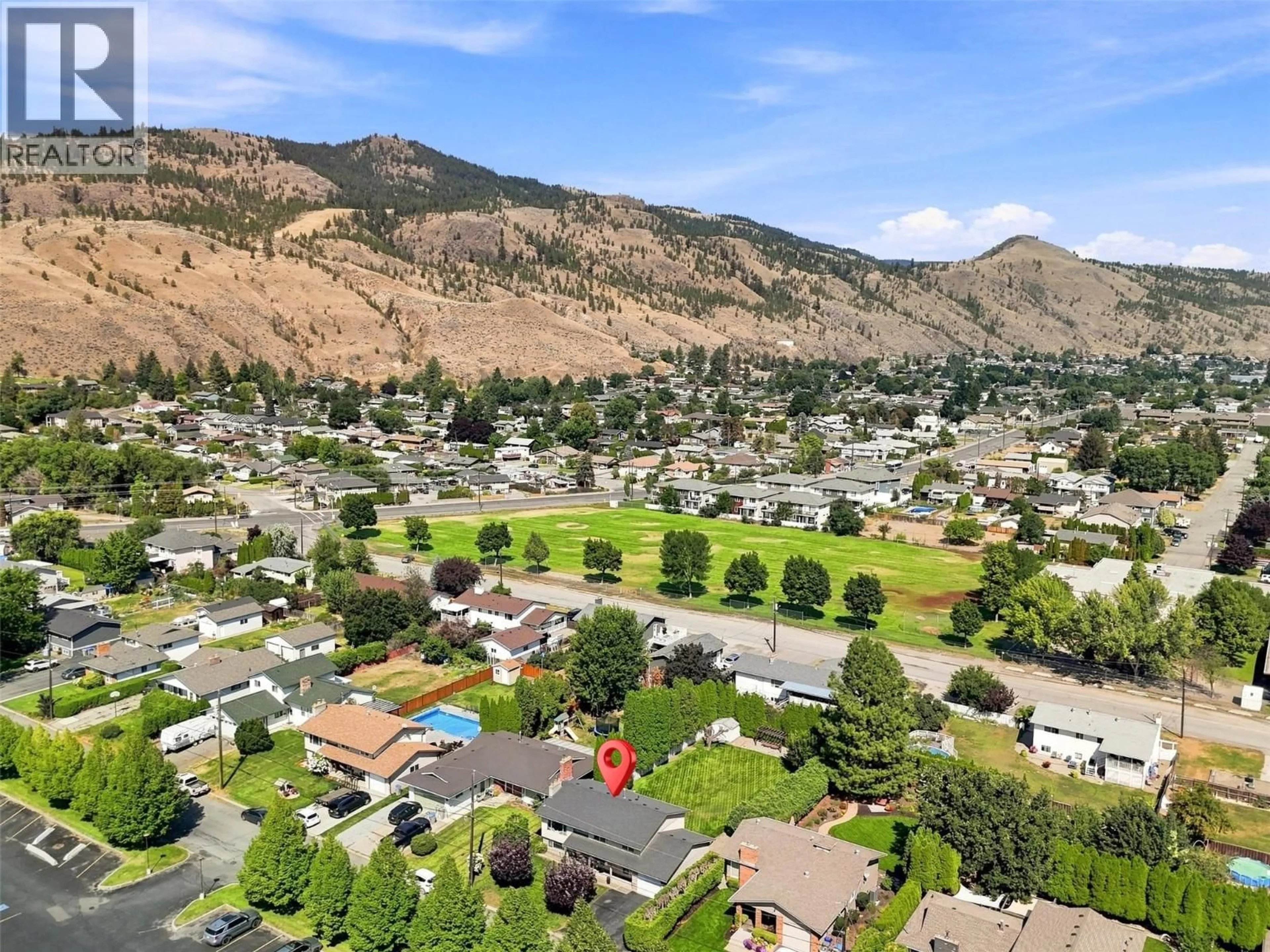 A pic from outside/outdoor area/front of a property/back of a property/a pic from drone, mountain view for 718 CLEMENTS COURT, Kamloops British Columbia V2B8C2