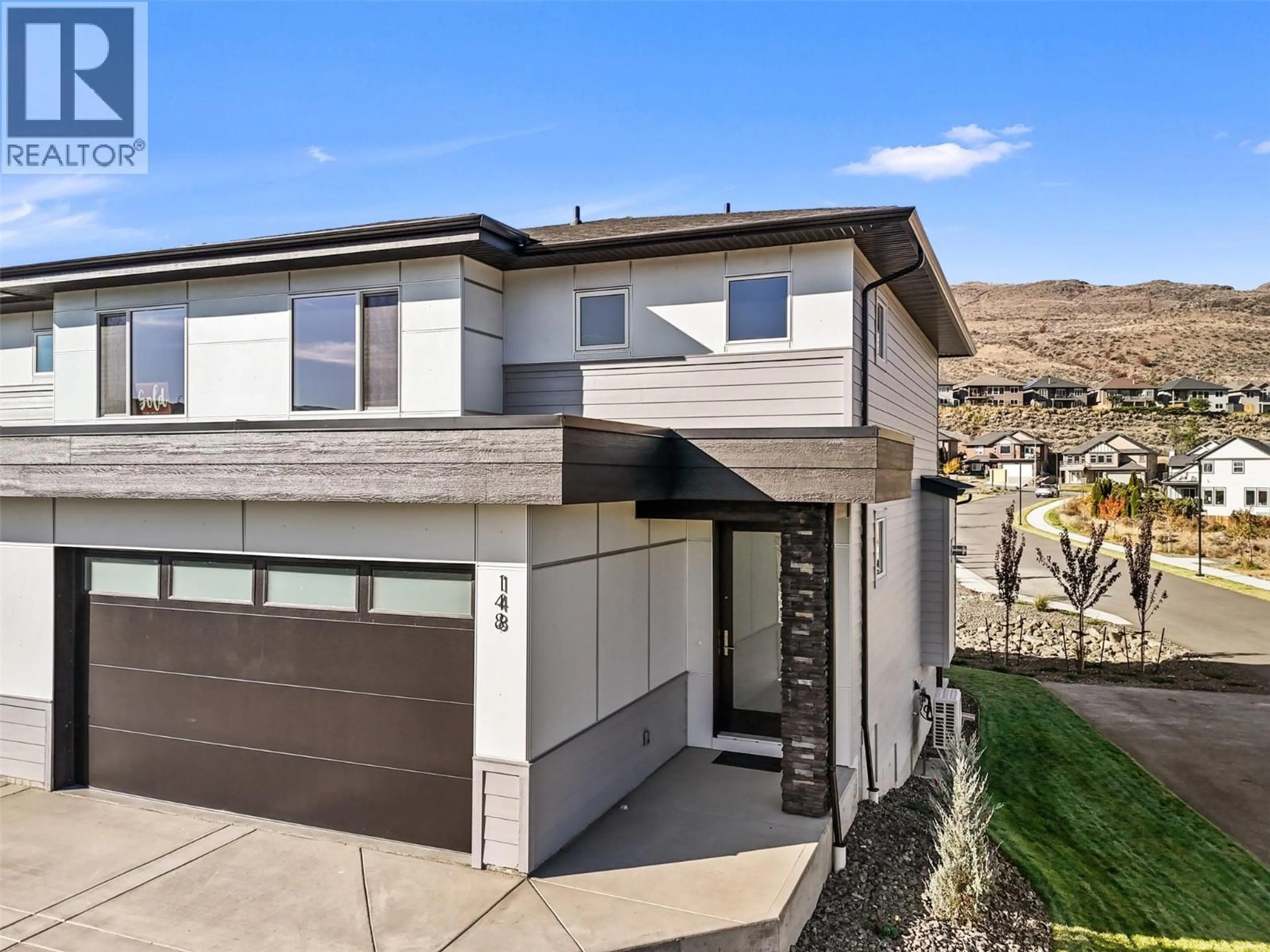 Home with vinyl exterior material, street for 148 - 2050 GRASSLANDS BOULEVARD, Kamloops British Columbia V2B0K7