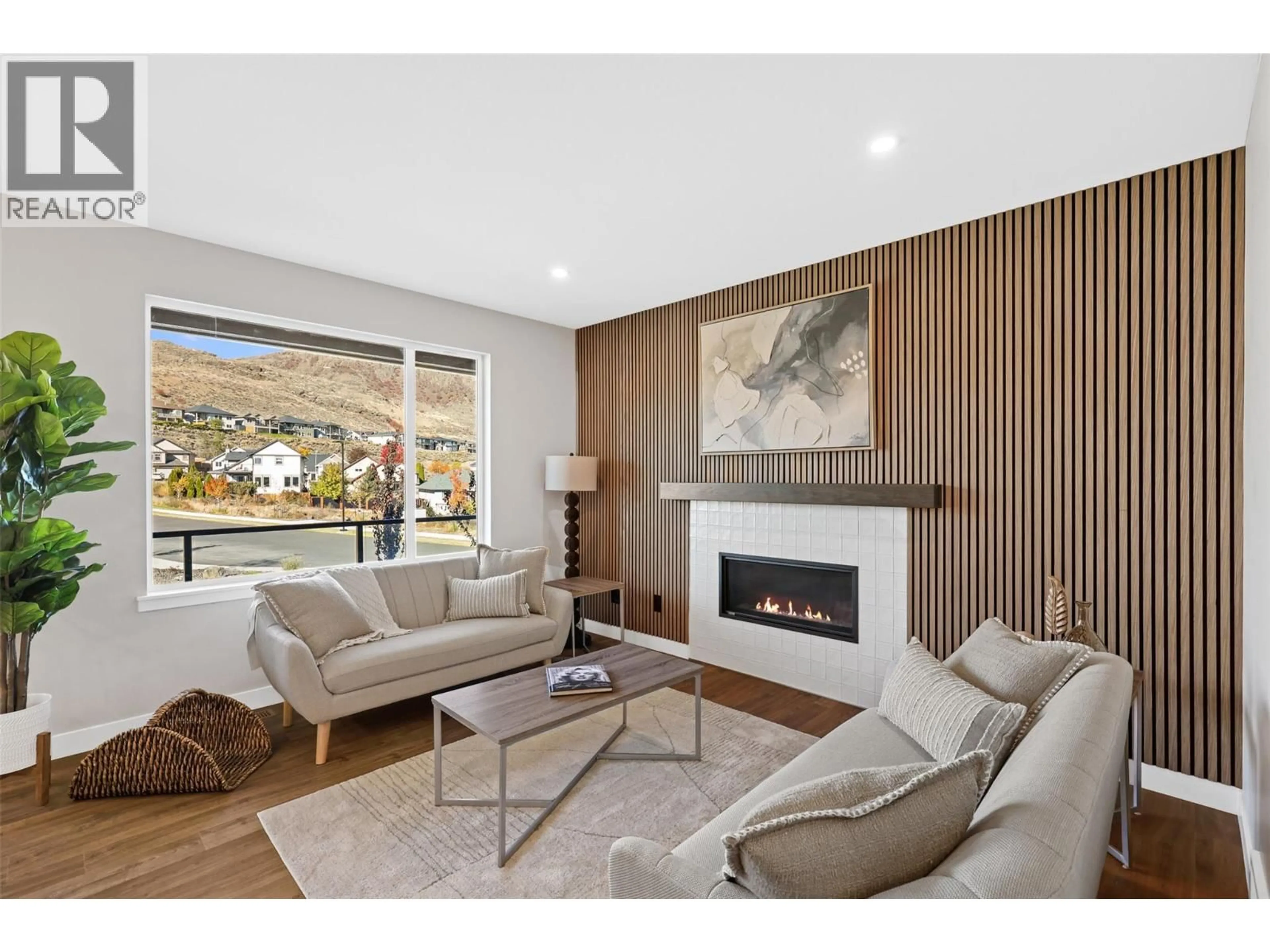 Living room with furniture, wood/laminate floor for 148 - 2050 GRASSLANDS BOULEVARD, Kamloops British Columbia V2B0K7