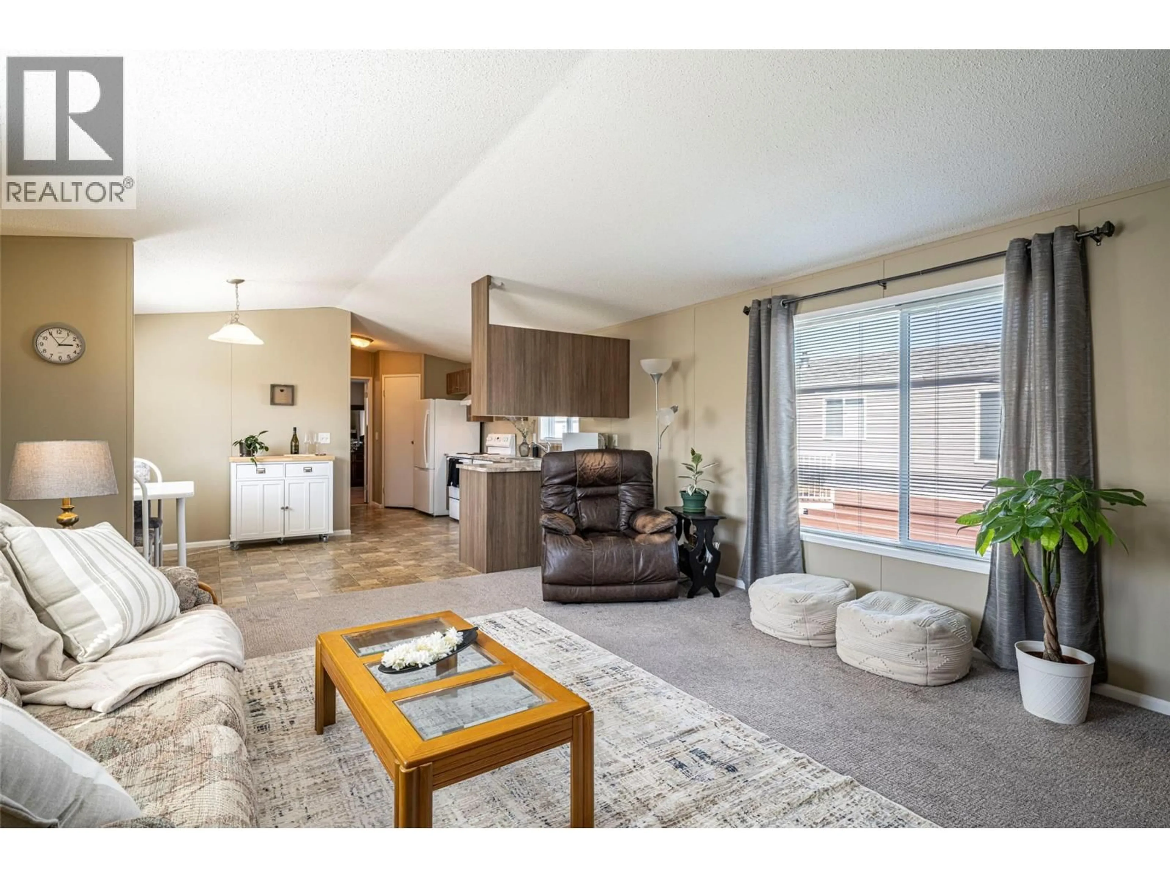 Living room with furniture, unknown for 74 - 12560 WESTSIDE ROAD, Vernon British Columbia V1H1S9