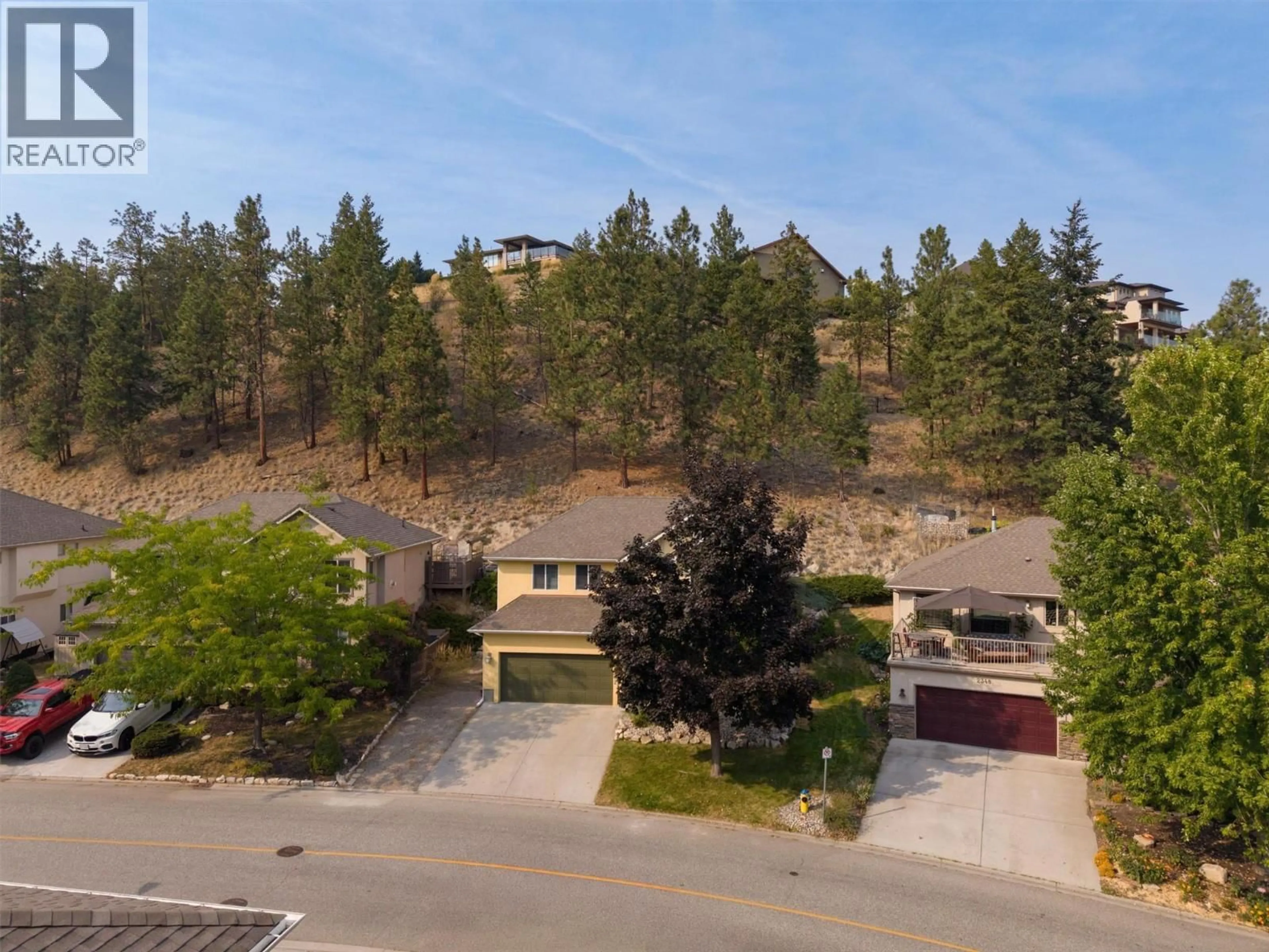A pic from outside/outdoor area/front of a property/back of a property/a pic from drone, mountain view for 2352 SELKIRK DRIVE, Kelowna British Columbia V1V2R5