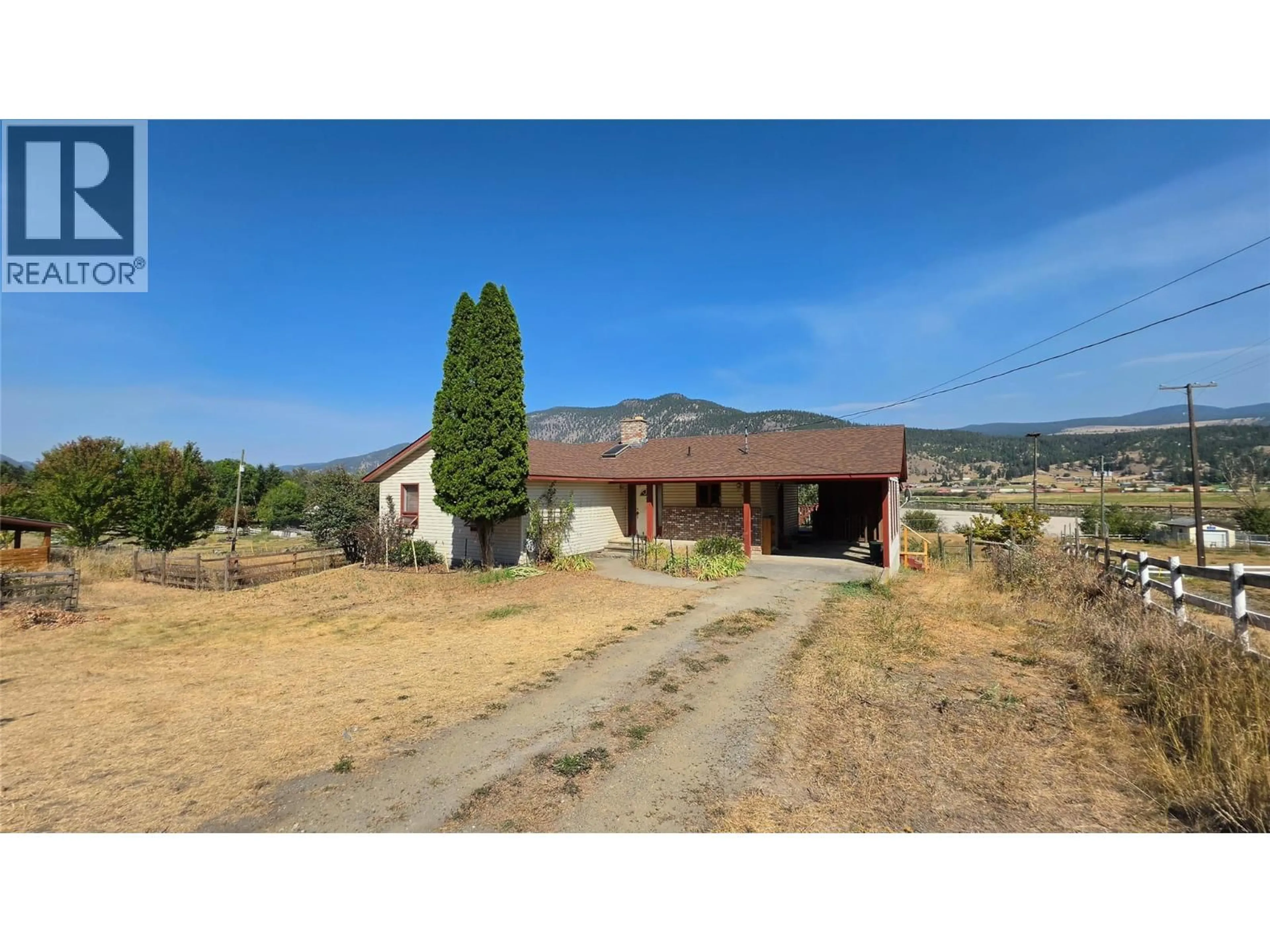 A pic from outside/outdoor area/front of a property/back of a property/a pic from drone, mountain view for 8544 WESTSYDE ROAD, Kamloops British Columbia V2B8S3