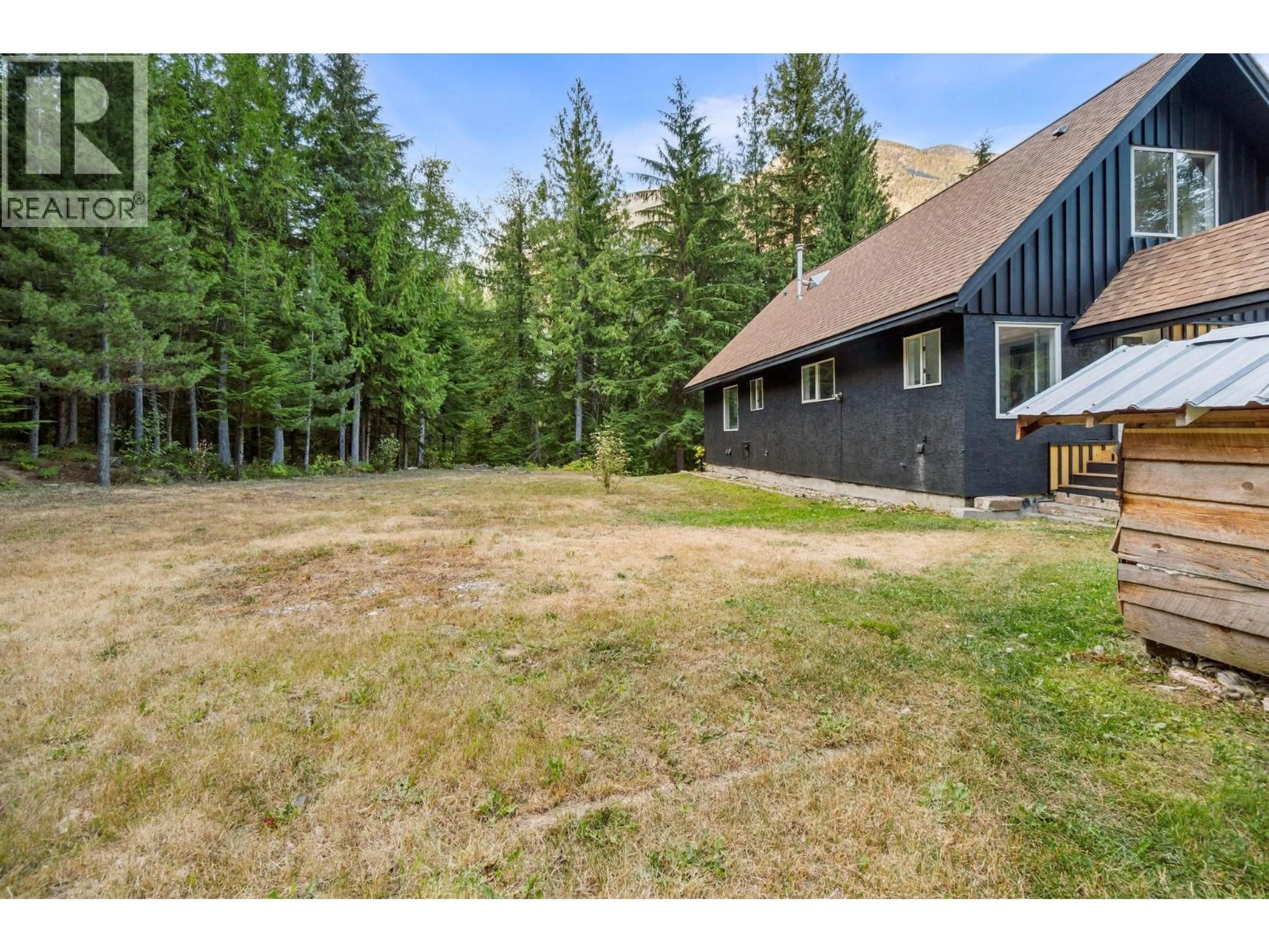 A pic from outside/outdoor area/front of a property/back of a property/a pic from drone, unknown for 2227 ALLSHOUSE ROAD, Summit Lake British Columbia V0G1R1