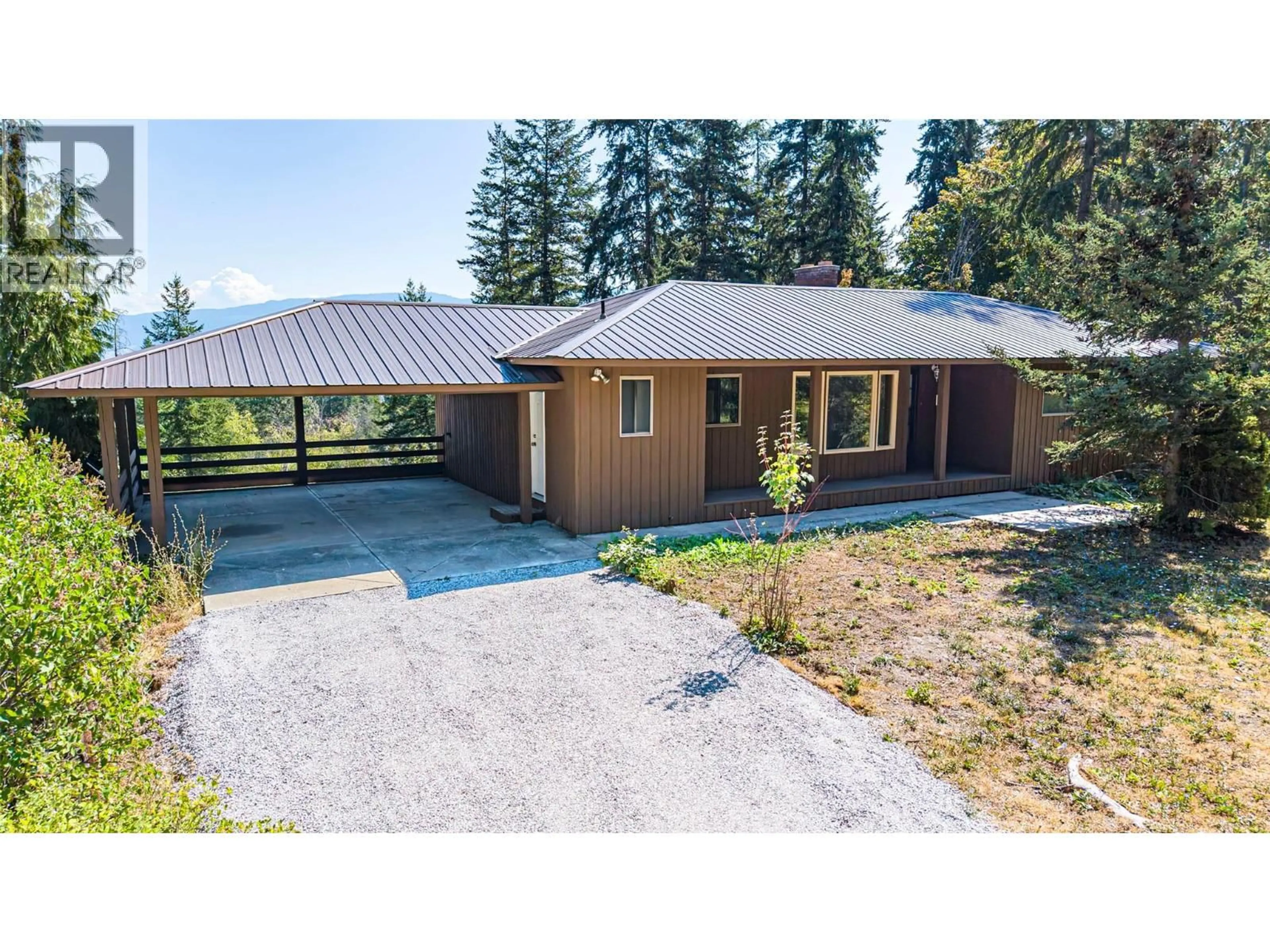 A pic from outside/outdoor area/front of a property/back of a property/a pic from drone, unknown for 4358 CHAMBERLAINE ROAD, Spallumcheen British Columbia V4Y0M1