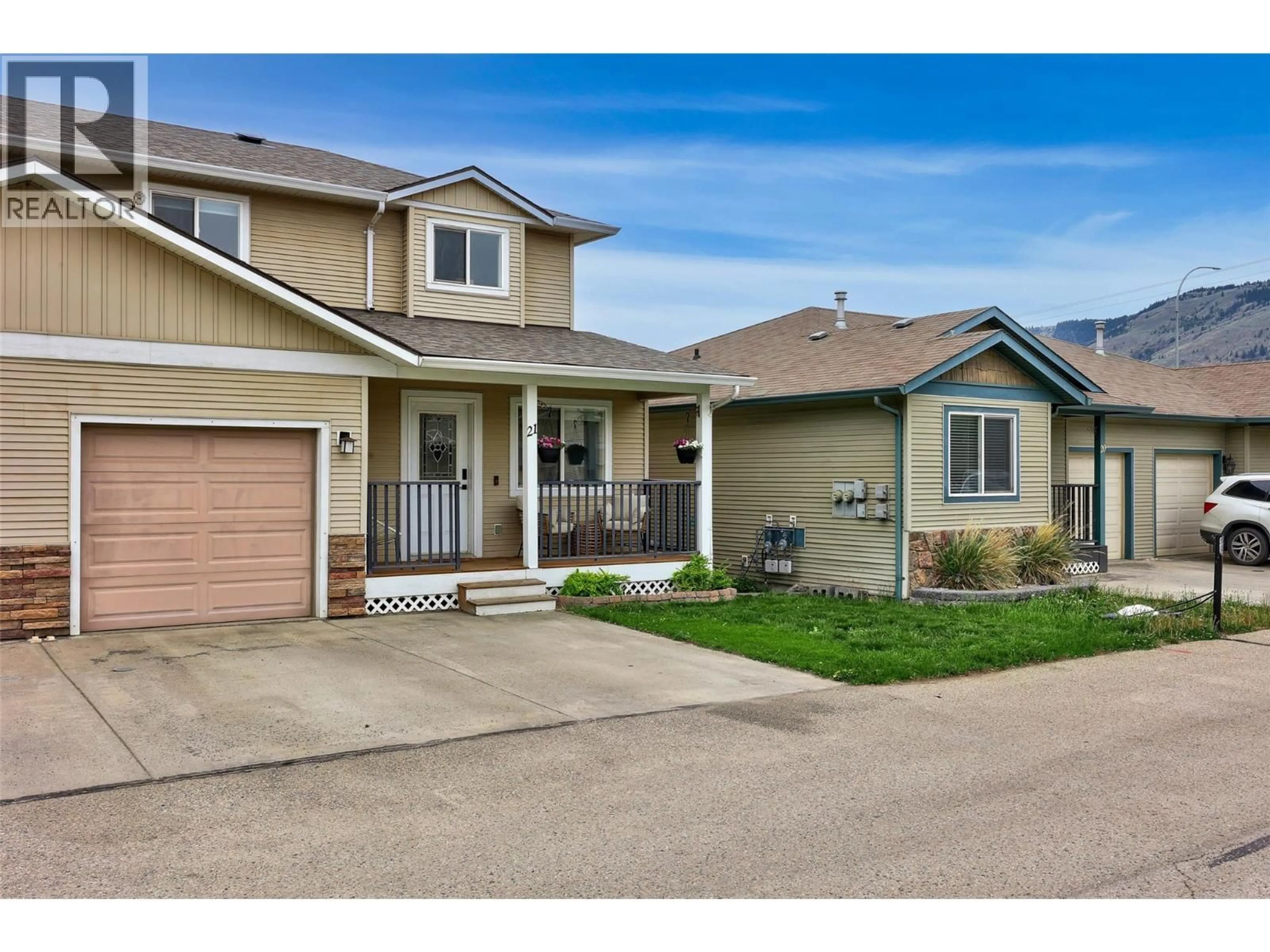 Home with vinyl exterior material, street for 21 - 5200 DALLAS DRIVE, Kamloops British Columbia V2C6Y8