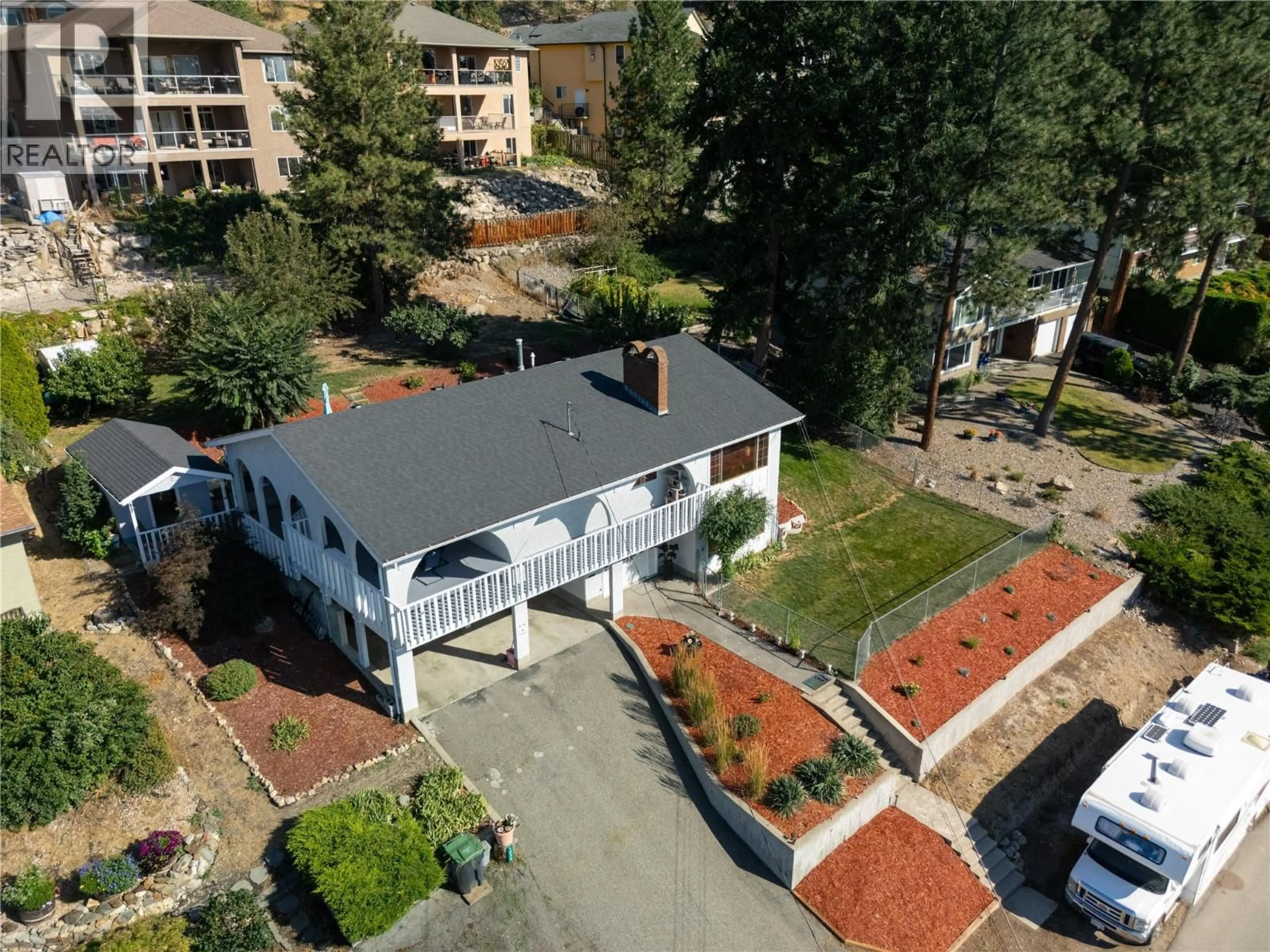 A pic from outside/outdoor area/front of a property/back of a property/a pic from drone, unknown for 1035 TOOVEY ROAD, Kelowna British Columbia V1X6R2
