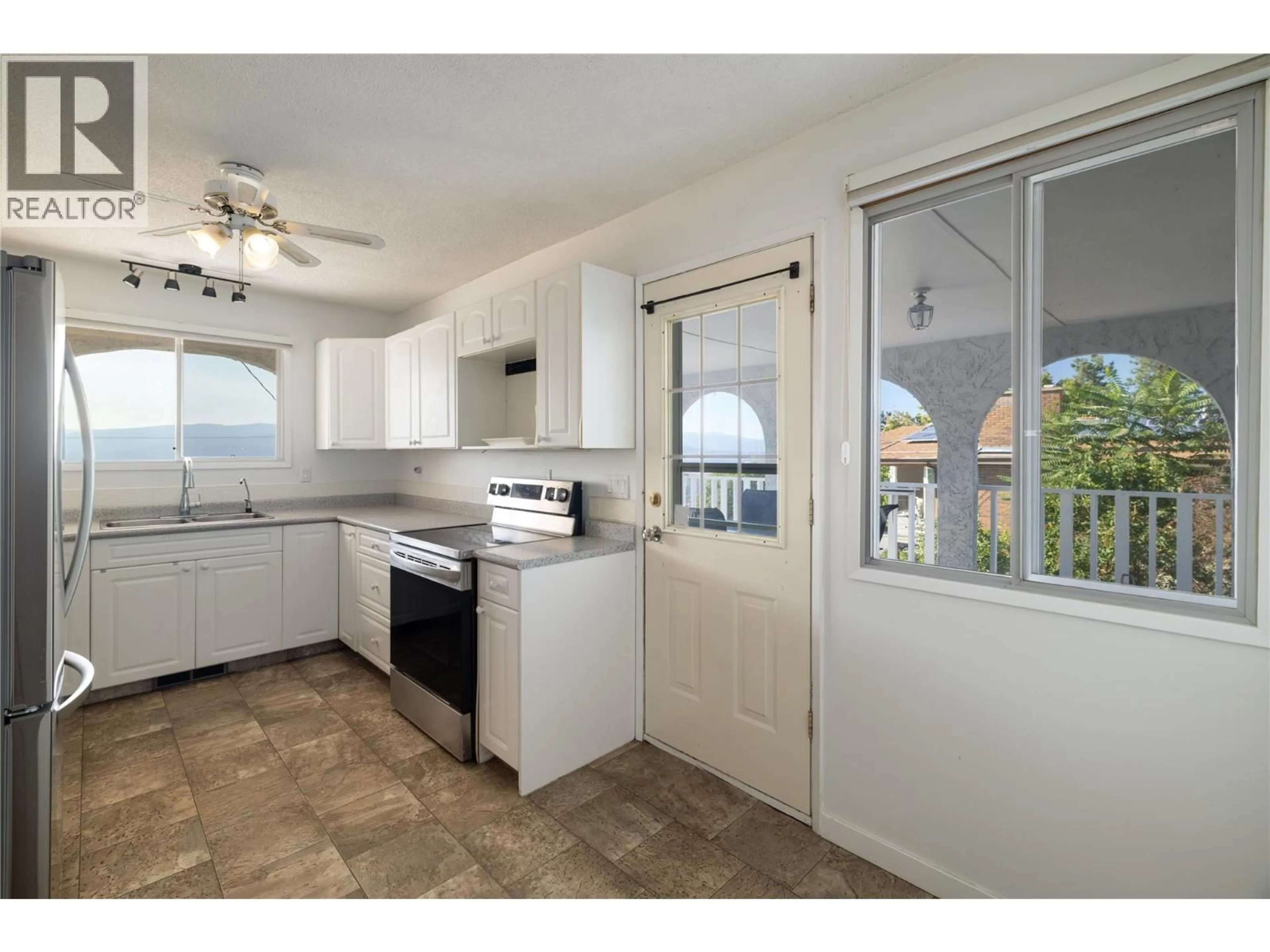 Standard kitchen, ceramic/tile floor for 1035 TOOVEY ROAD, Kelowna British Columbia V1X6R2