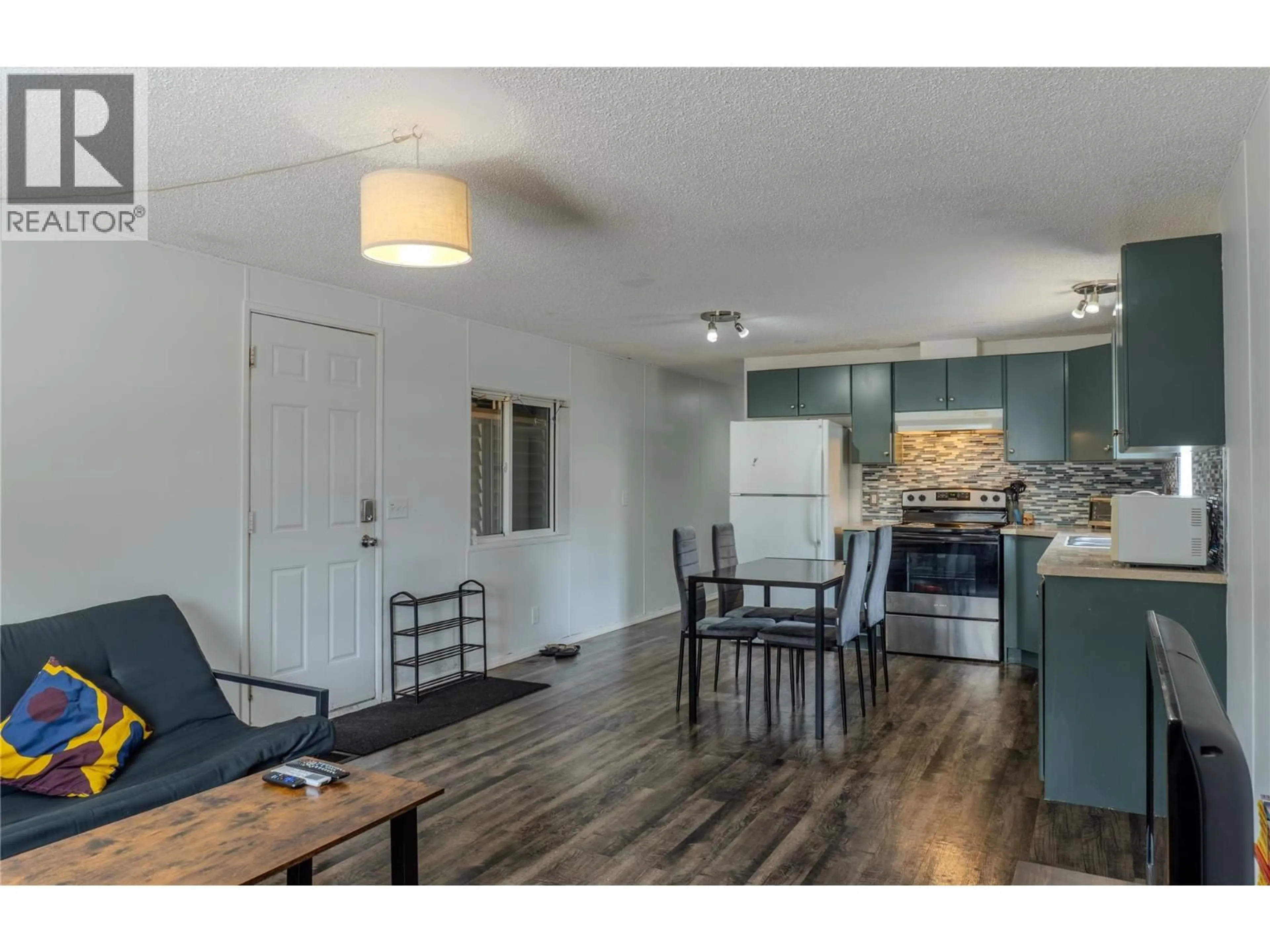 Open concept kitchen, wood/laminate floor for 10 - 606 EDWARD STREET, Revelstoke British Columbia V0E2S0