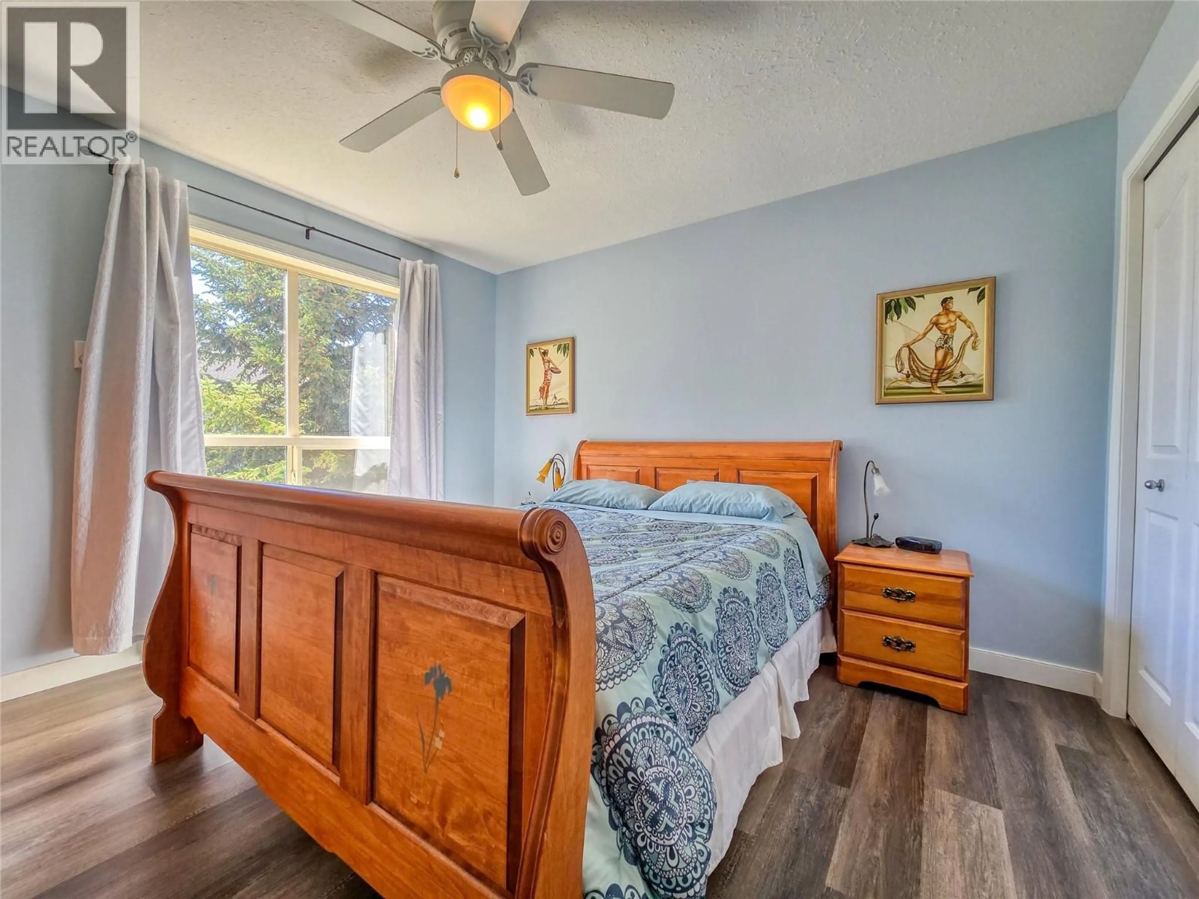 Bedroom with bed, wood/laminate floor for 213 - 4769 FORSTERS LANDING ROAD, Radium Hot Springs British Columbia V0A1M0