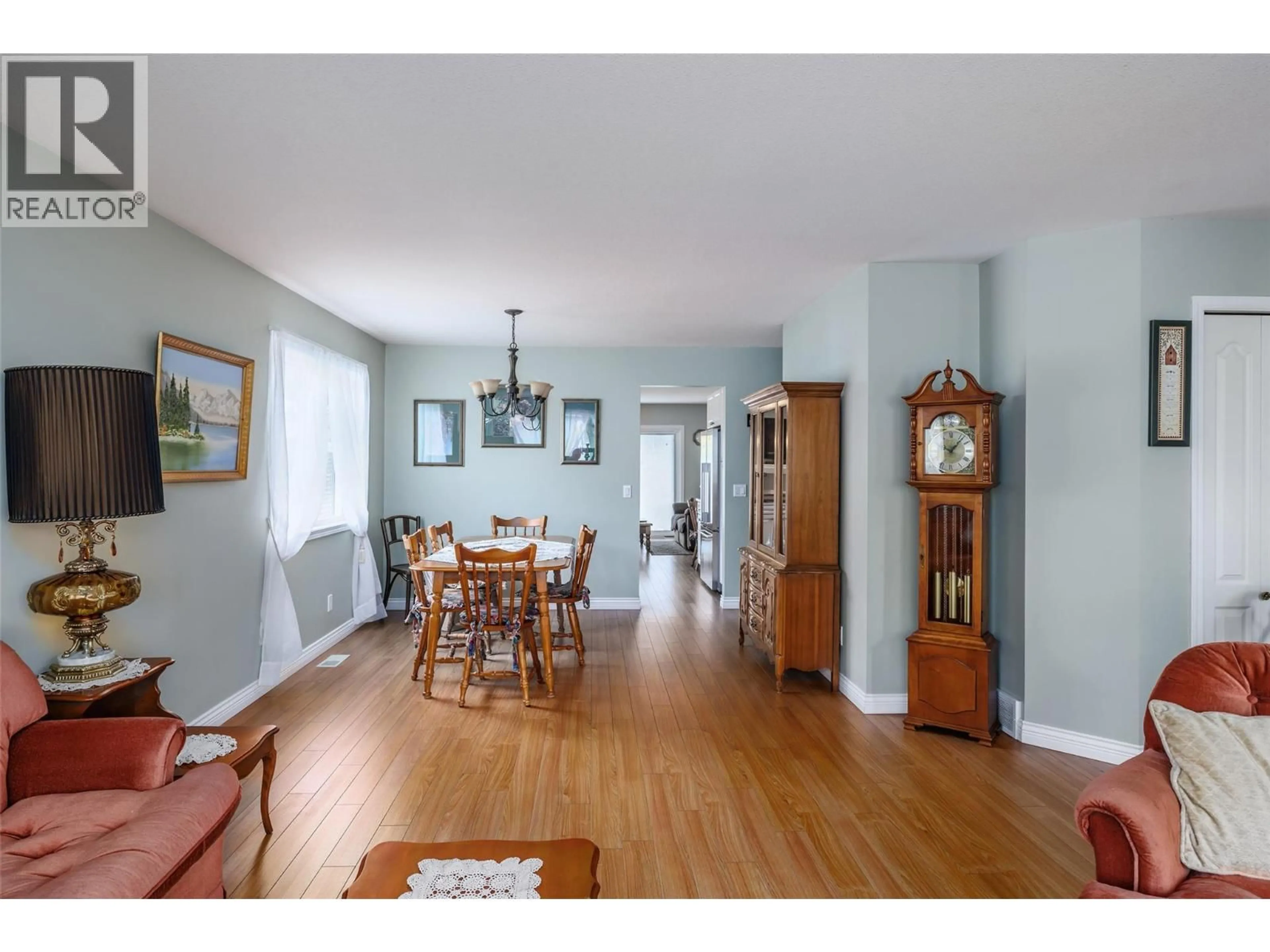 Dining room, wood/laminate floor for 13 - 615 GLENMEADOWS ROAD, Kelowna British Columbia V1V1N9